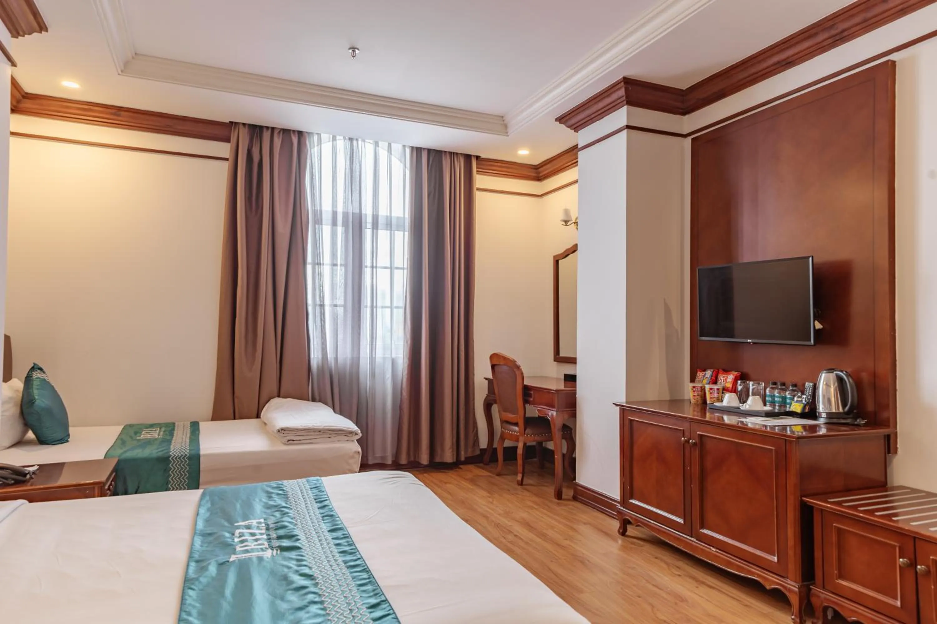 Bed in IBIZA Riverfront Da Nang Hotel