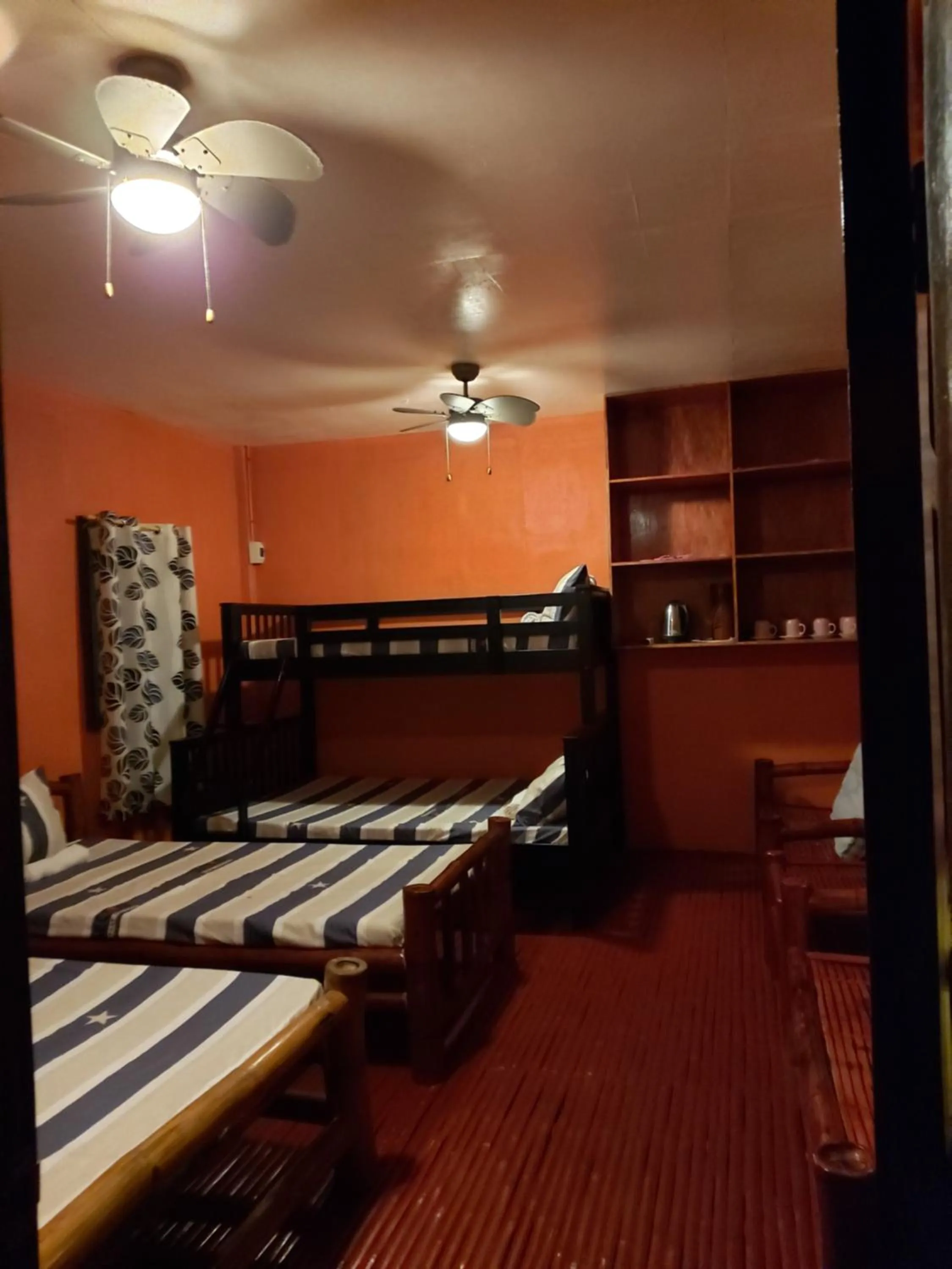 Bed in Anda Poseidon’s Beach Resort