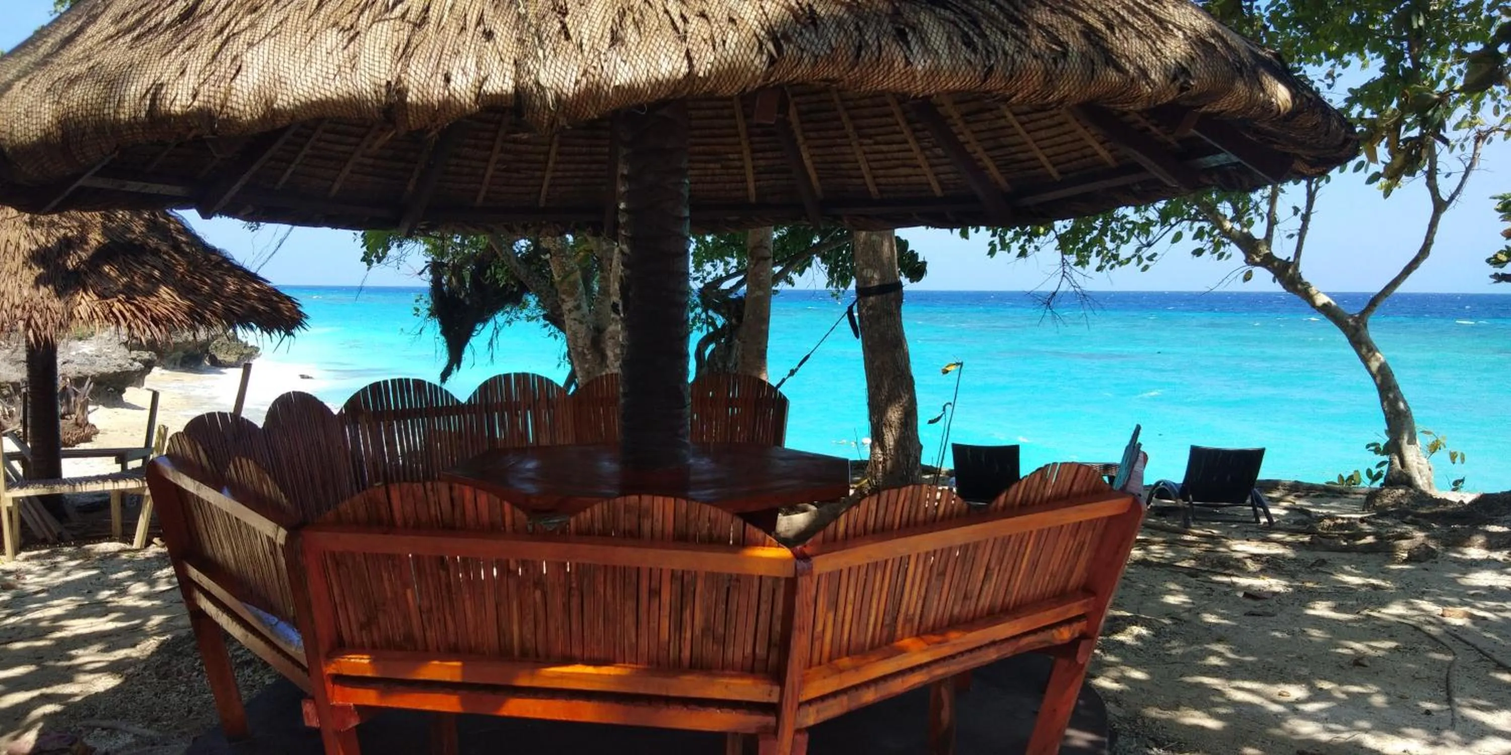Seating area in Anda Poseidon’s Beach Resort