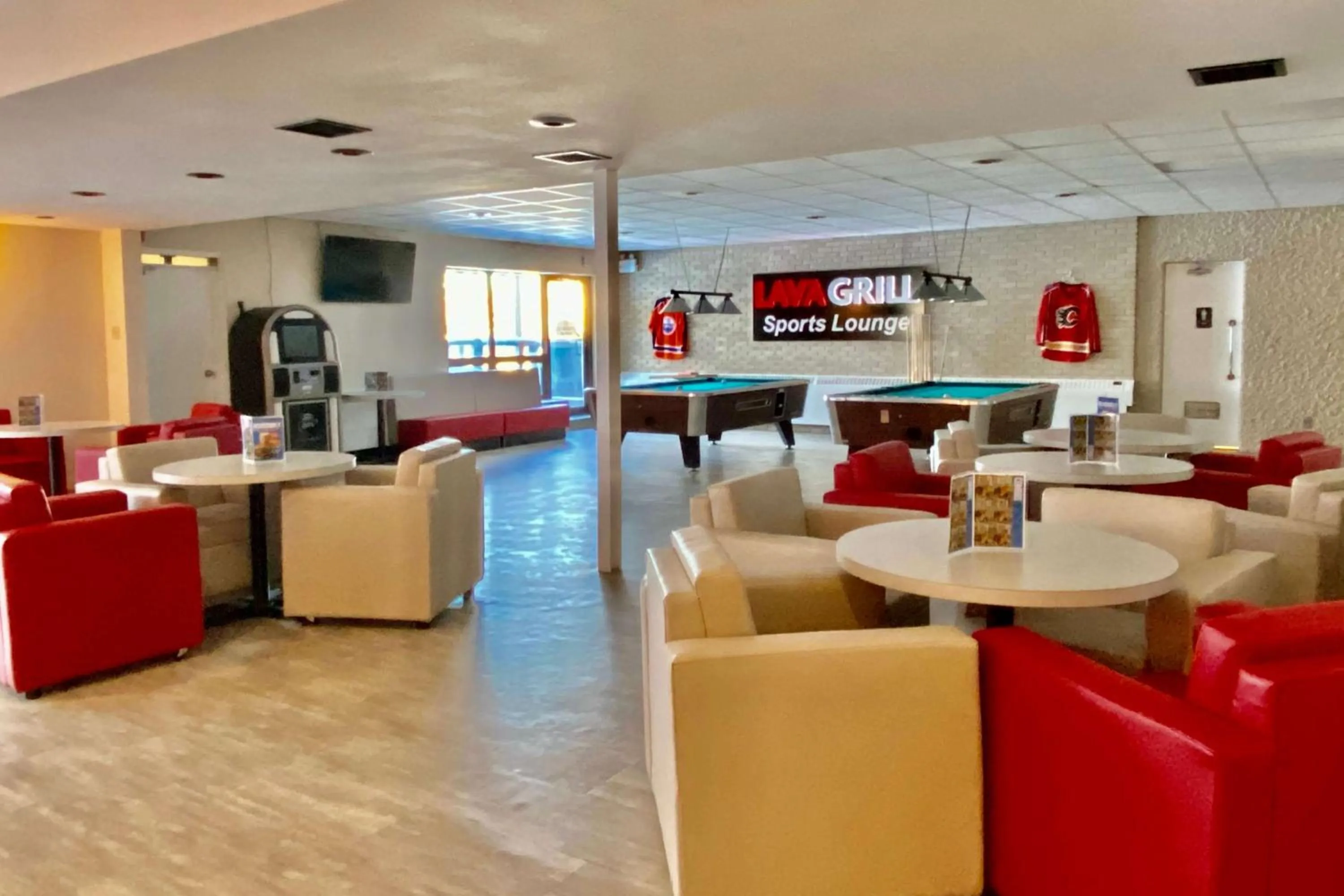 Lounge or bar in Ramada by Wyndham Whitecourt