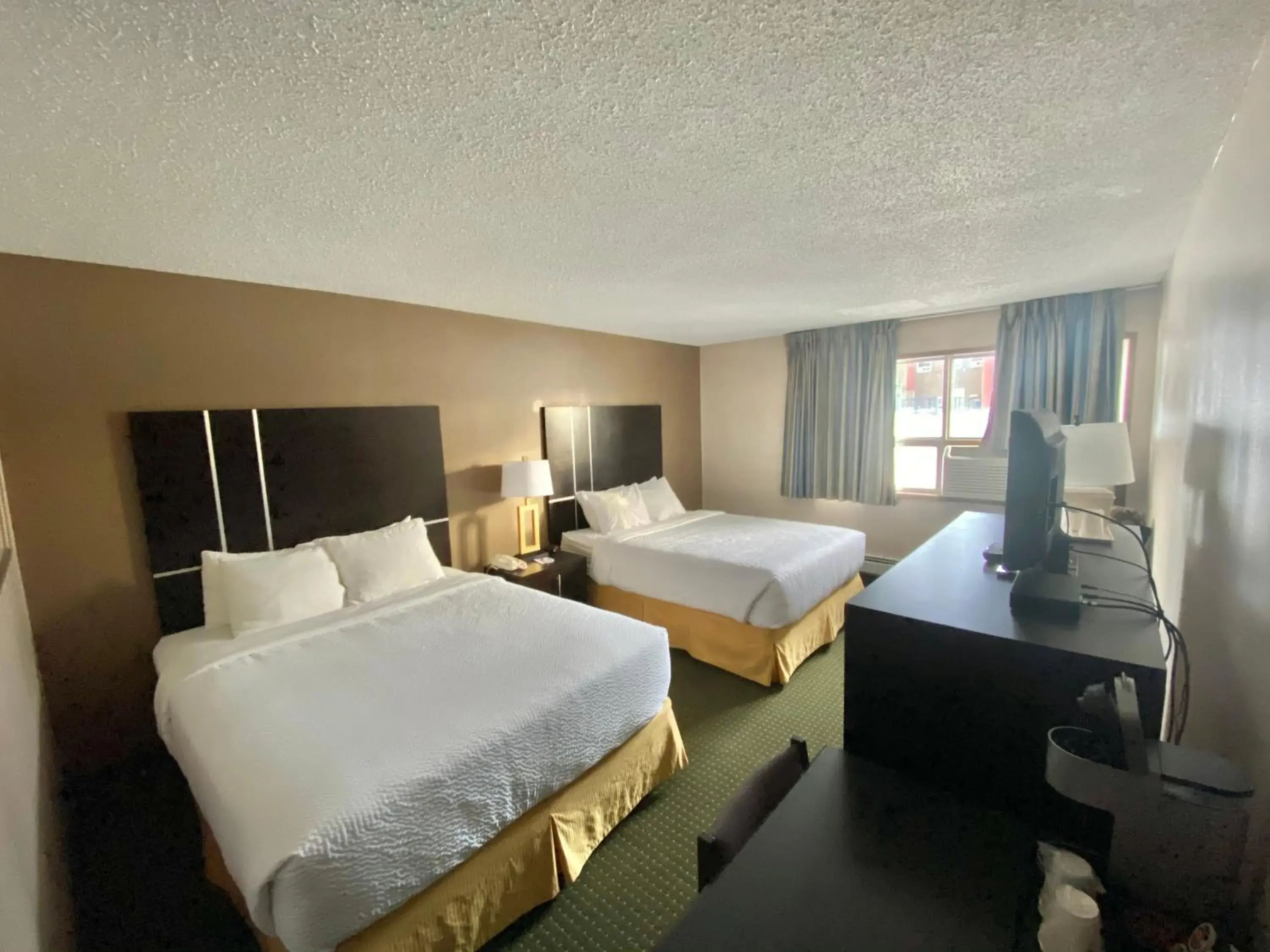 Bedroom, Bed in Ramada by Wyndham Whitecourt Bedroom, Bed in Ramada by Wyndham Whitecourt