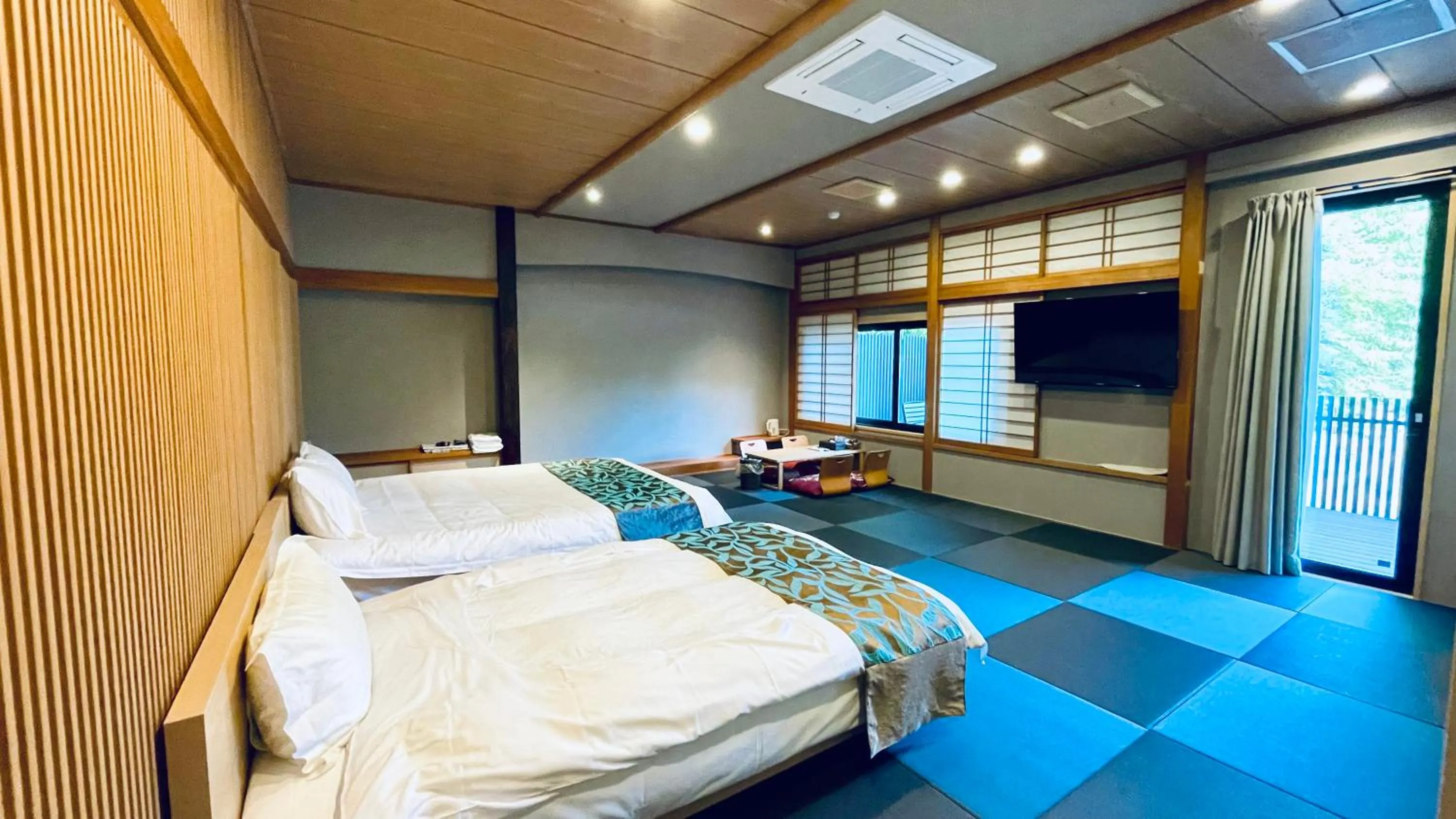 Bed in Kurobe Sunvalley Hotel