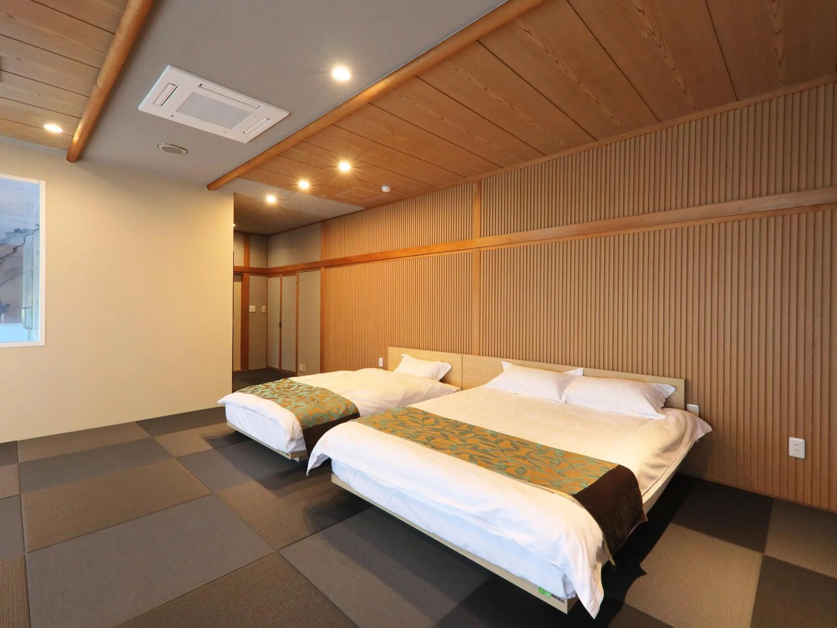 Photo of the whole room, Bed in Kurobe Sunvalley Hotel