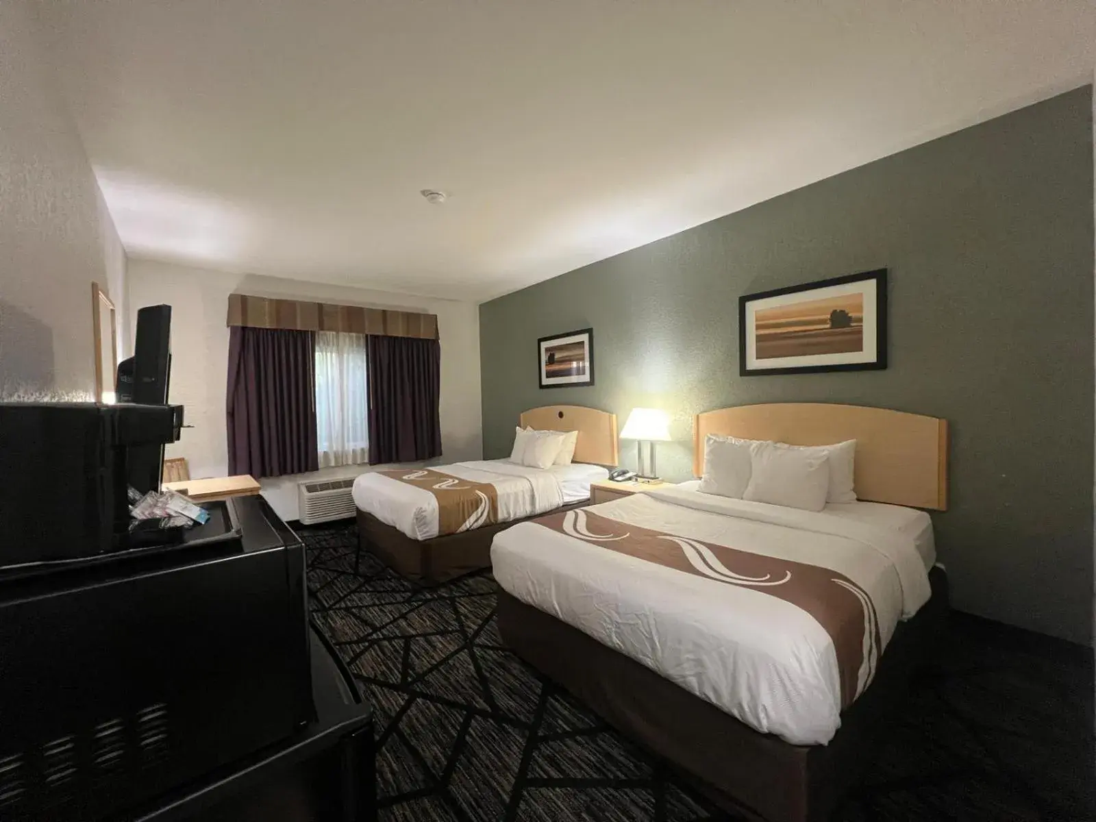 Bed in Quality Inn & Suites Loveland Bed in Quality Inn & Suites Loveland