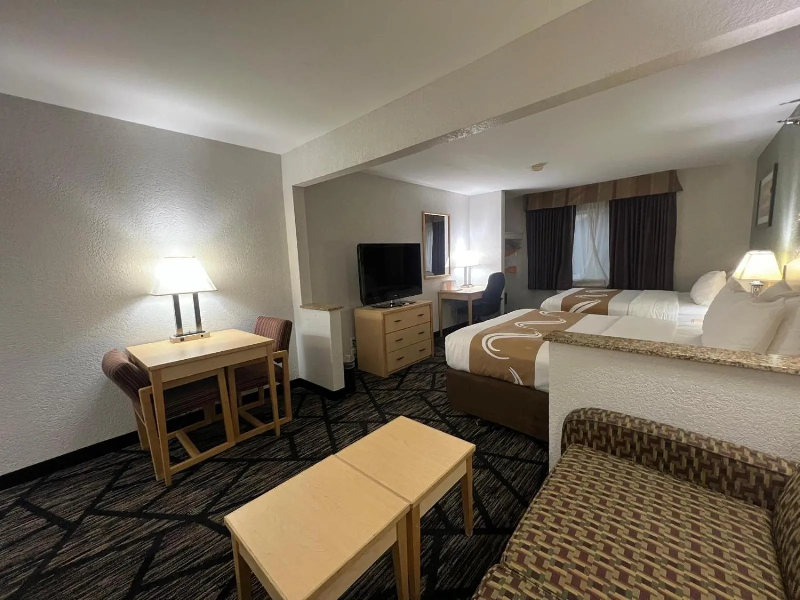 Bed in Quality Inn & Suites Loveland