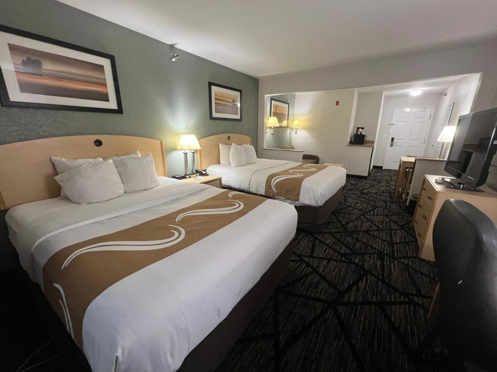 Bed in Quality Inn & Suites Loveland