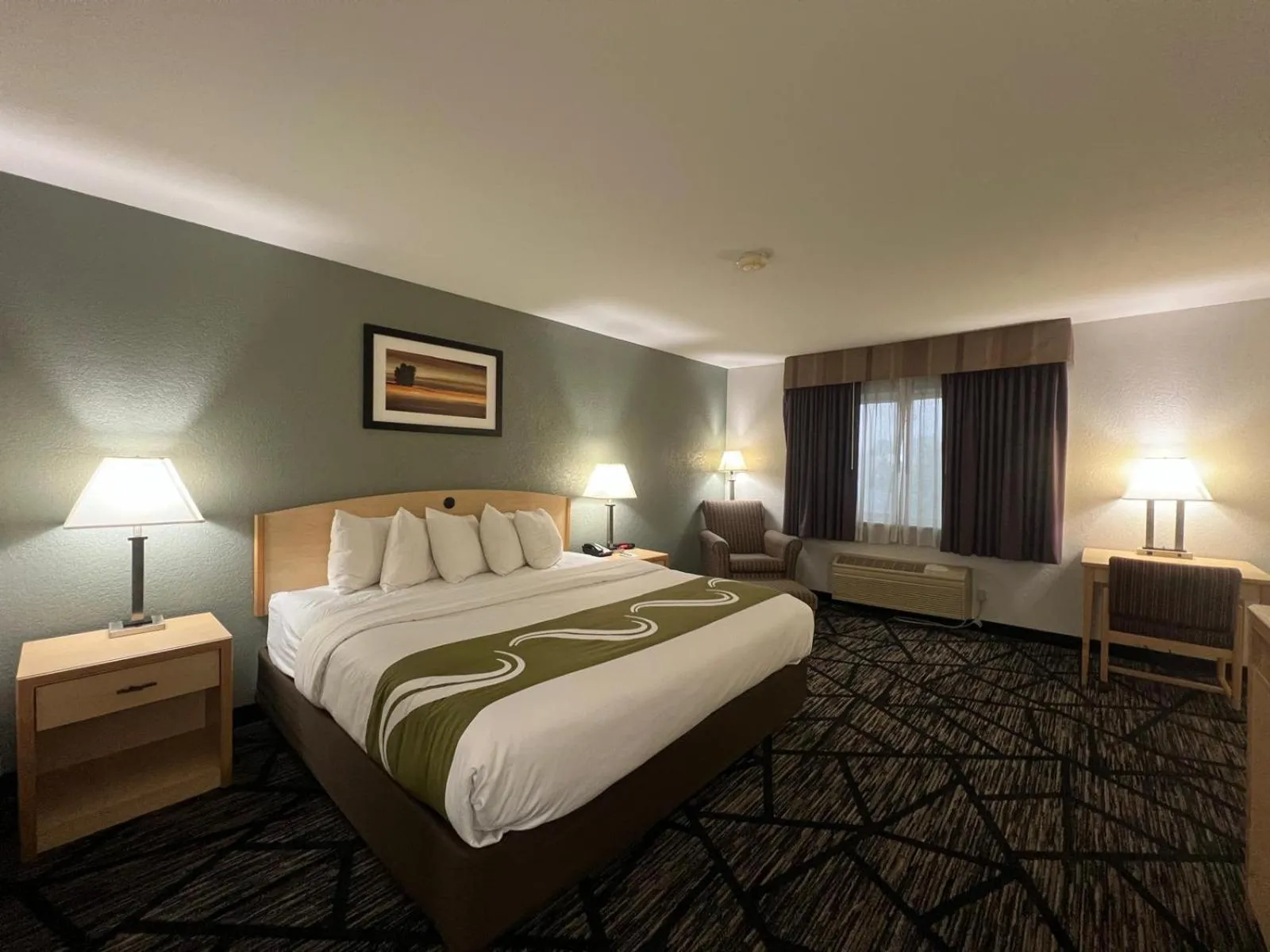 Bed in Quality Inn & Suites Loveland