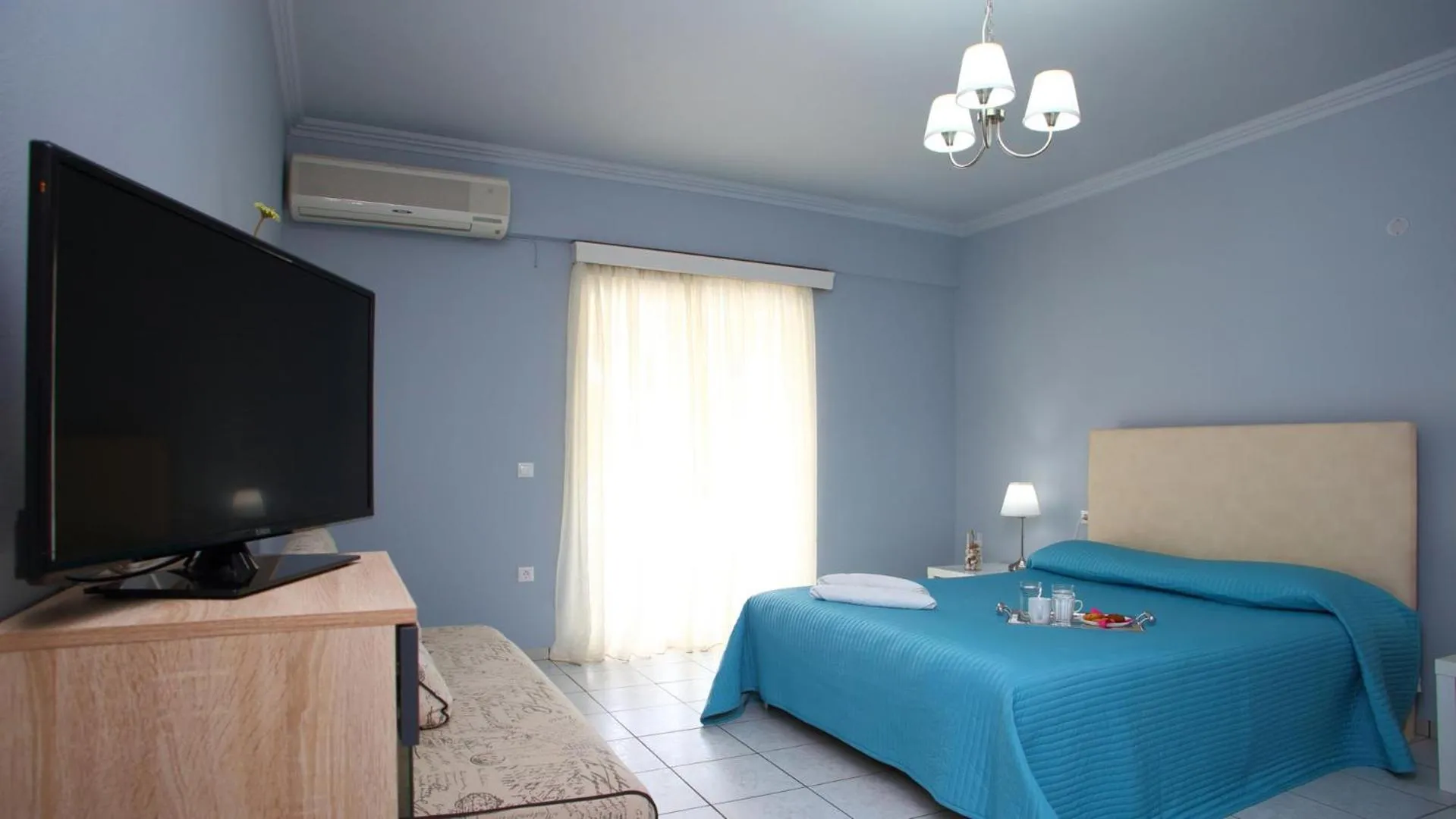 Bed in Nidri Bay Studios