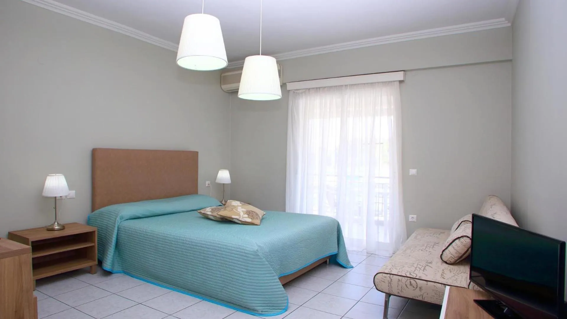 Bed in Nidri Bay Studios