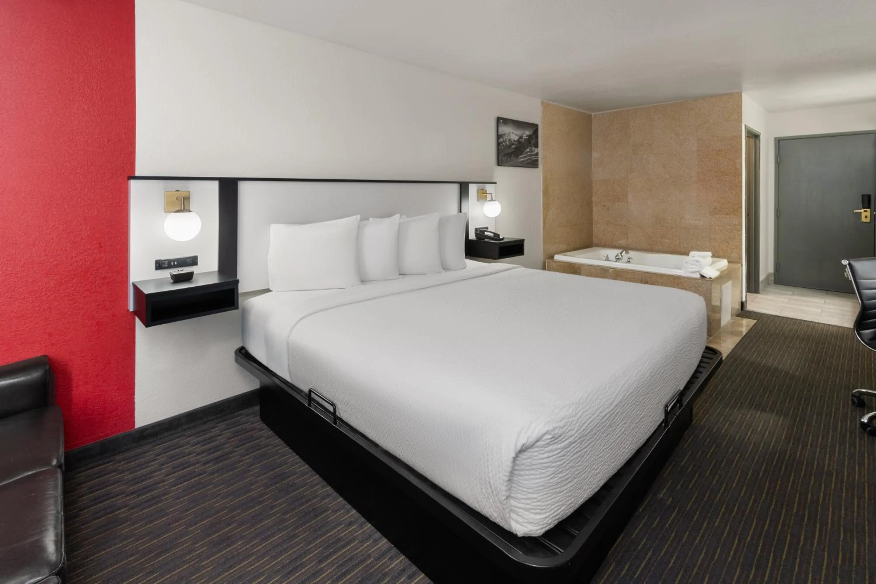 Bed in SYLO Hotel Denver Airport, a Ramada by Wyndham