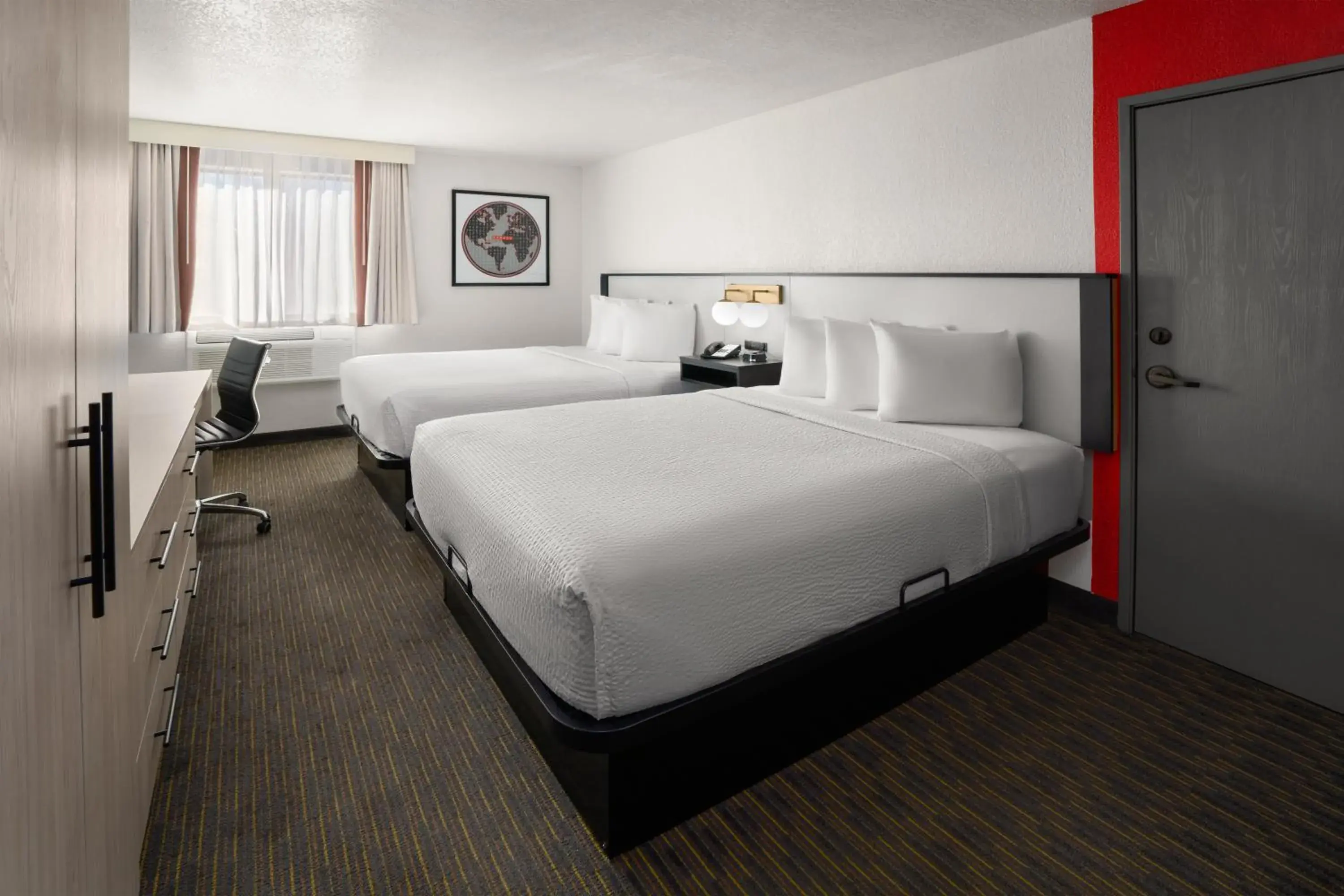 Queen Room with Two Queen Beds - Non-Smoking in SYLO Hotel Denver Airport, a Ramada by Wyndham Queen Room with Two Queen Beds - Non-Smoking in SYLO Hotel Denver Airport, a Ramada by Wyndham