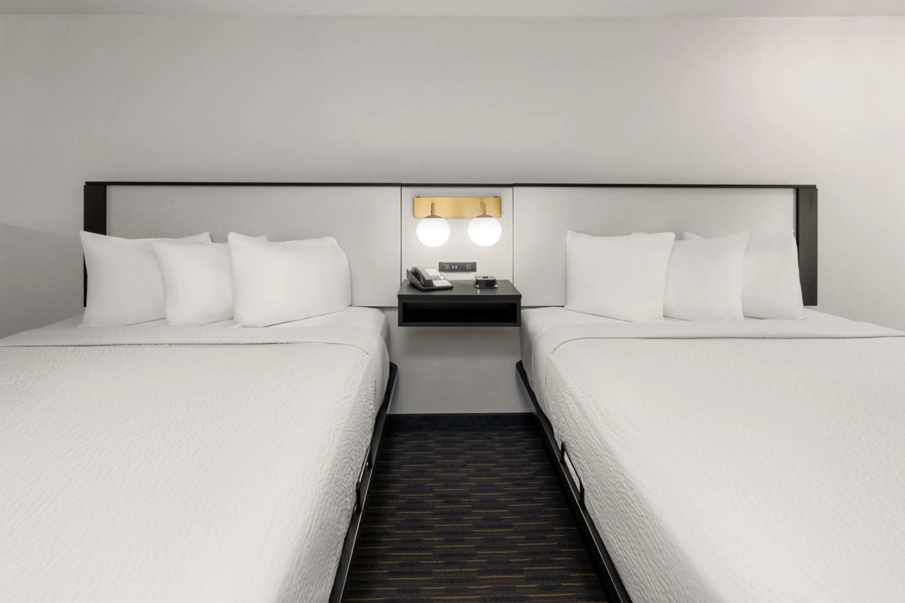 Bed in SYLO Hotel Denver Airport, a Ramada by Wyndham