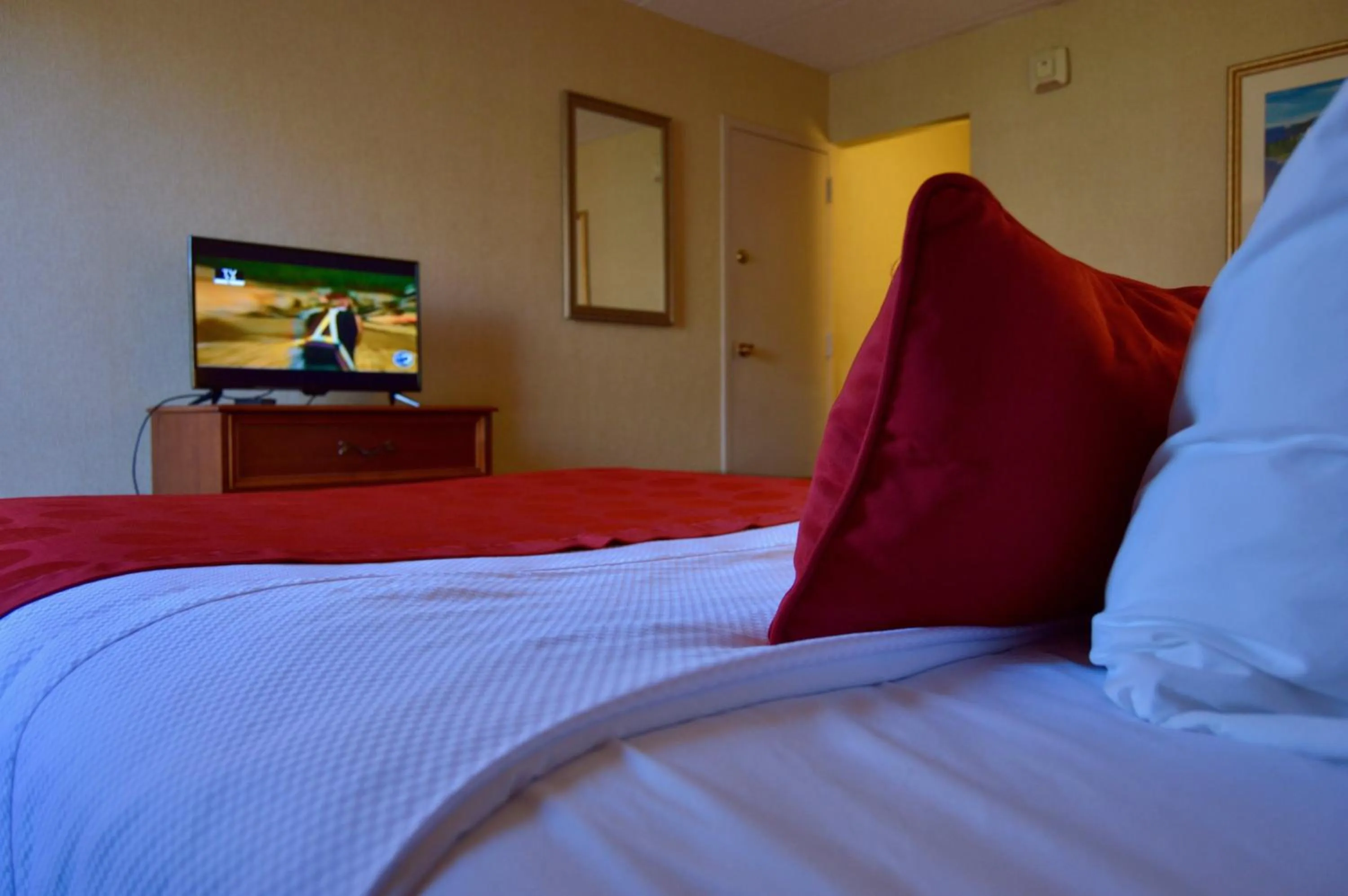 Bed in Mystic River Hotel & Suites