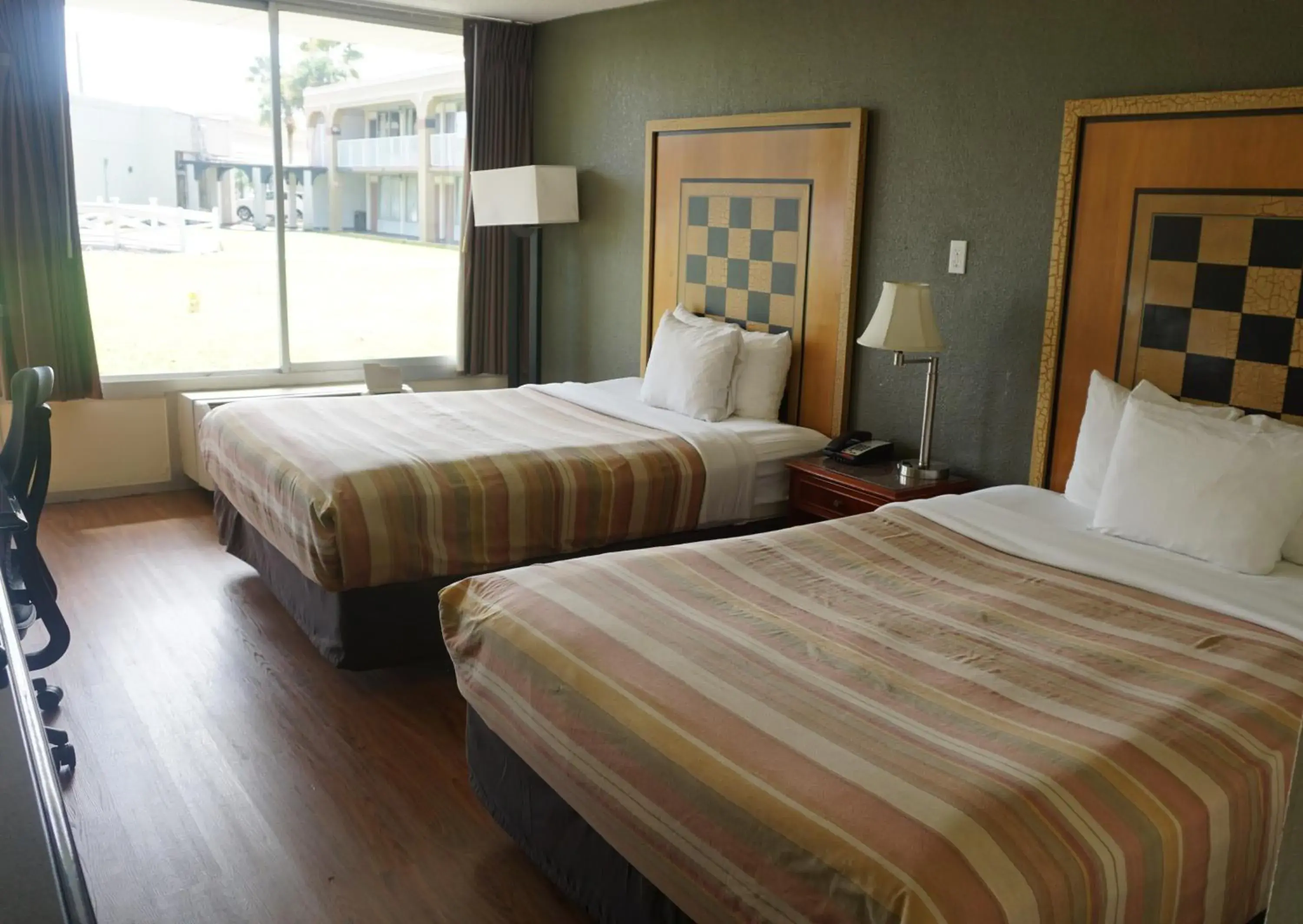 Bed in ISLAND HOTEL of Space Coast Bed in ISLAND HOTEL of Space Coast