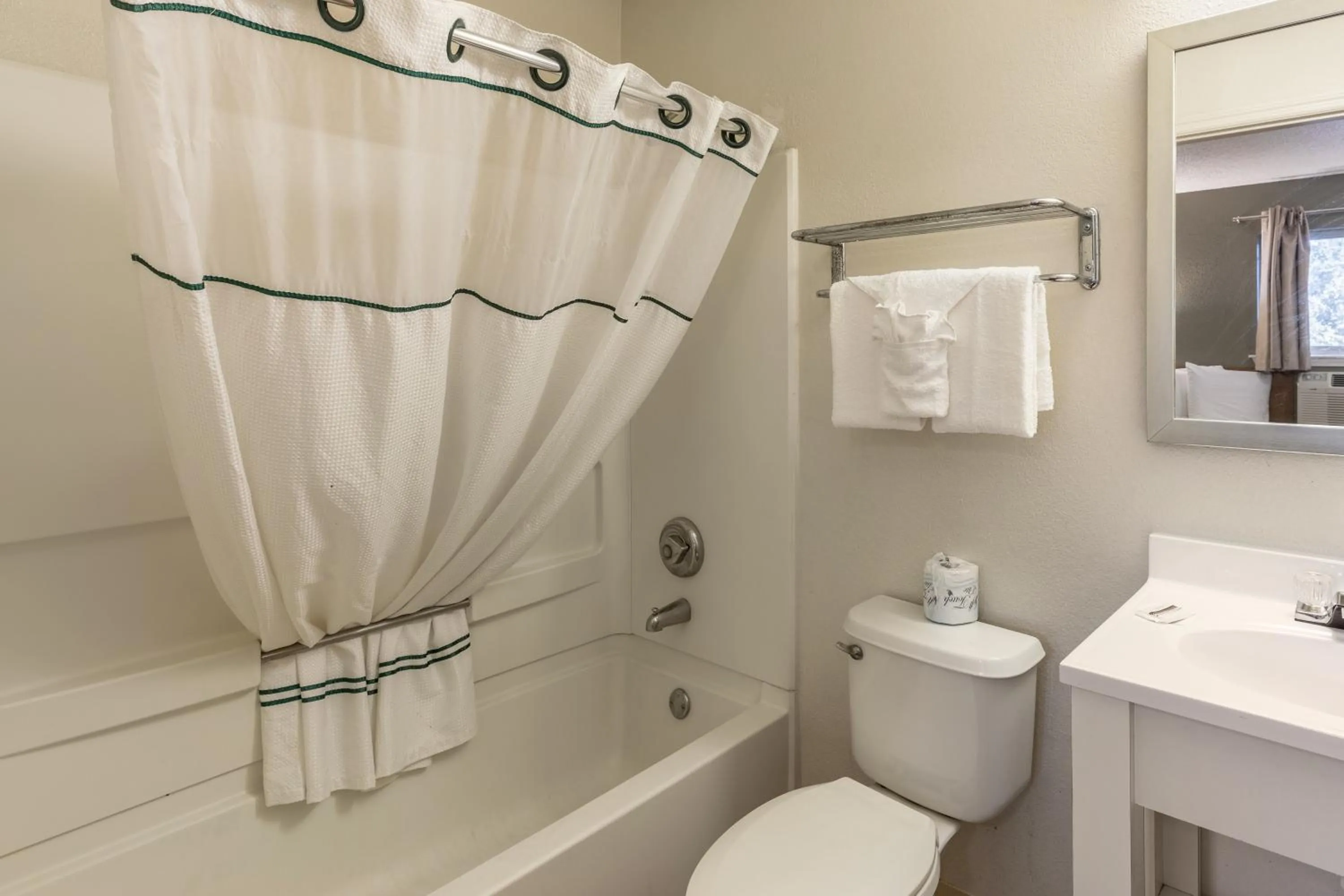 Photo of the whole room in HomeTowne Studios by Red Roof Orlando - Casselberry