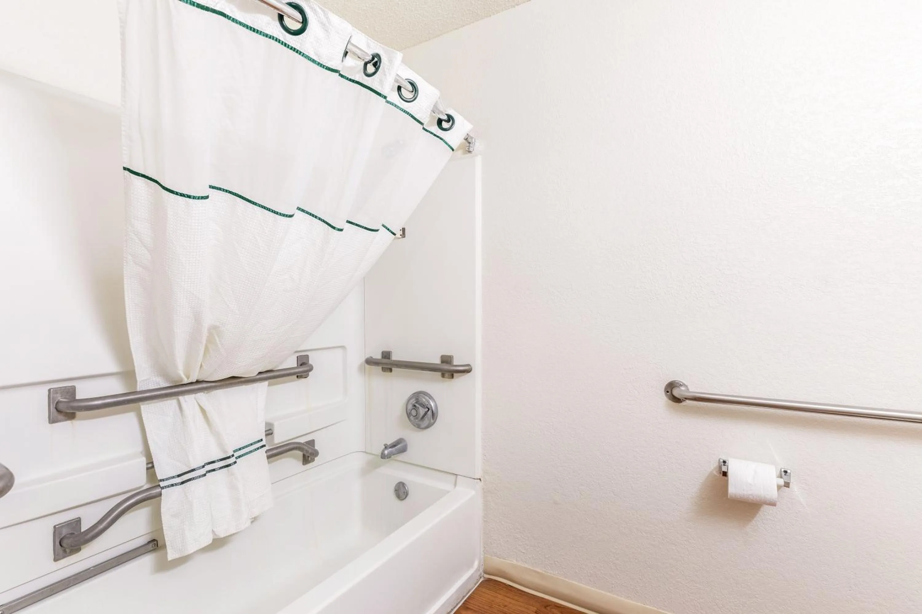 Bathroom in HomeTowne Studios by Red Roof Orlando - Casselberry