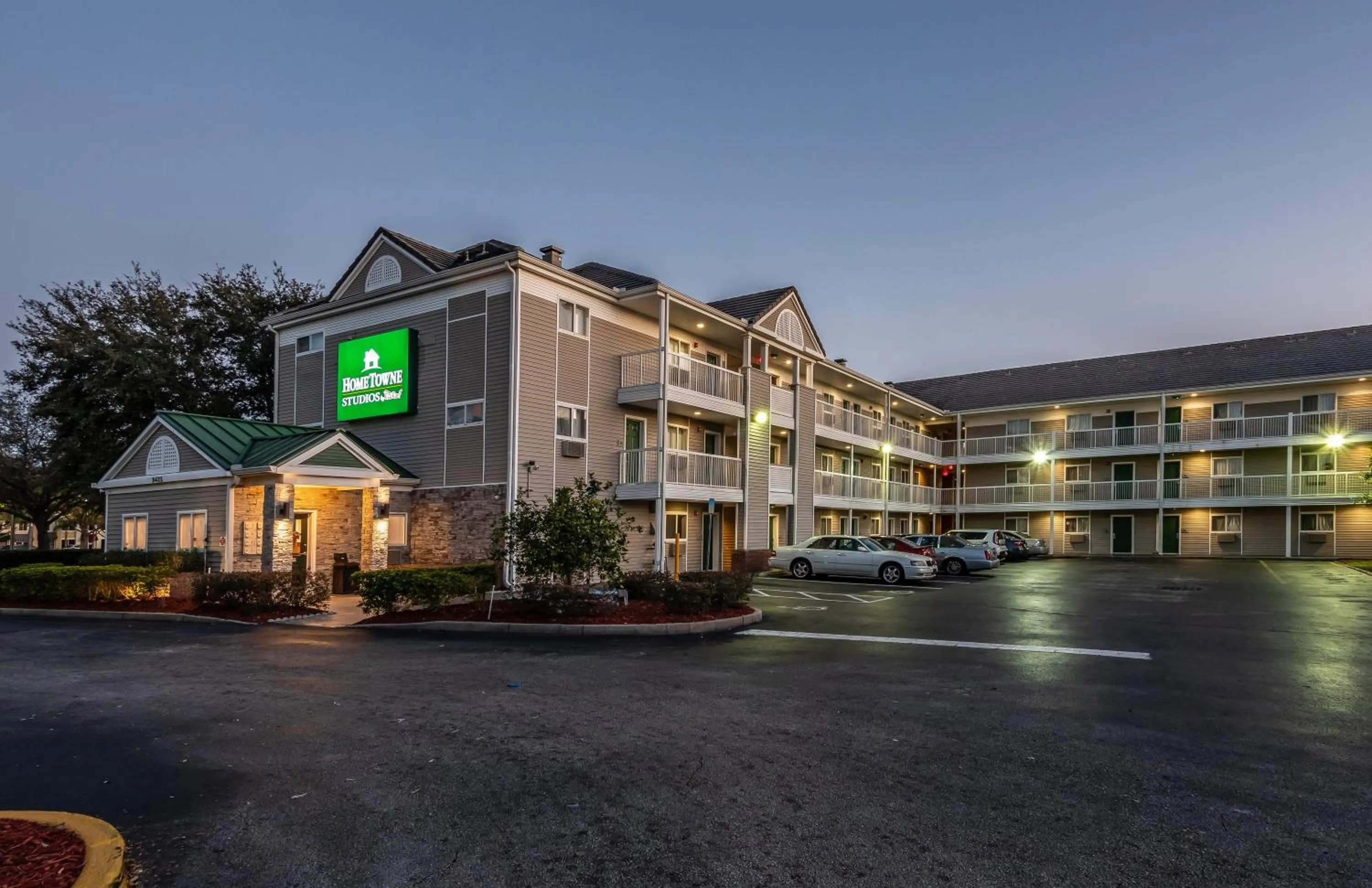 Property building in HomeTowne Studios by Red Roof Orlando South