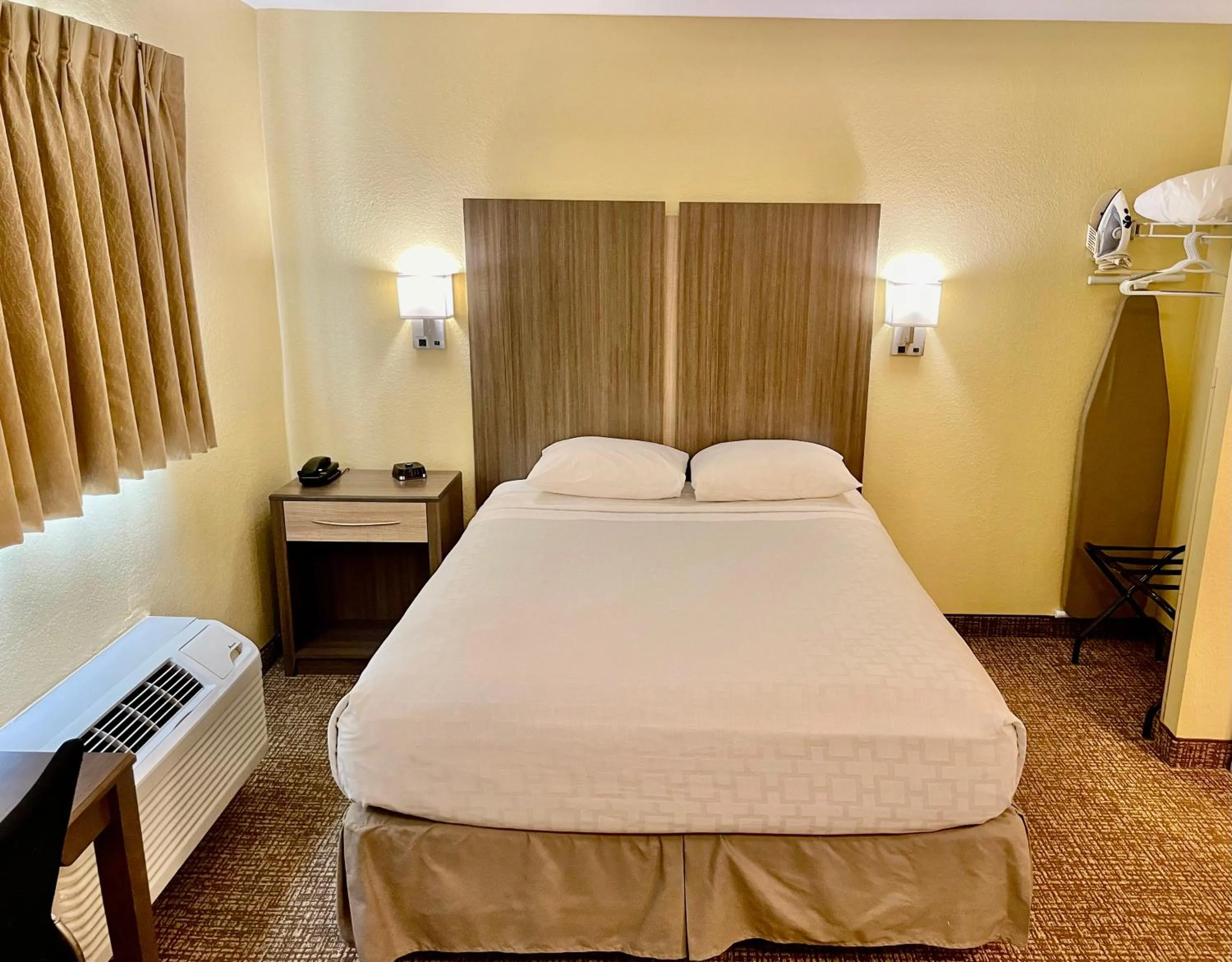 Bed in Suburban Studios Fort Myers Cape Coral