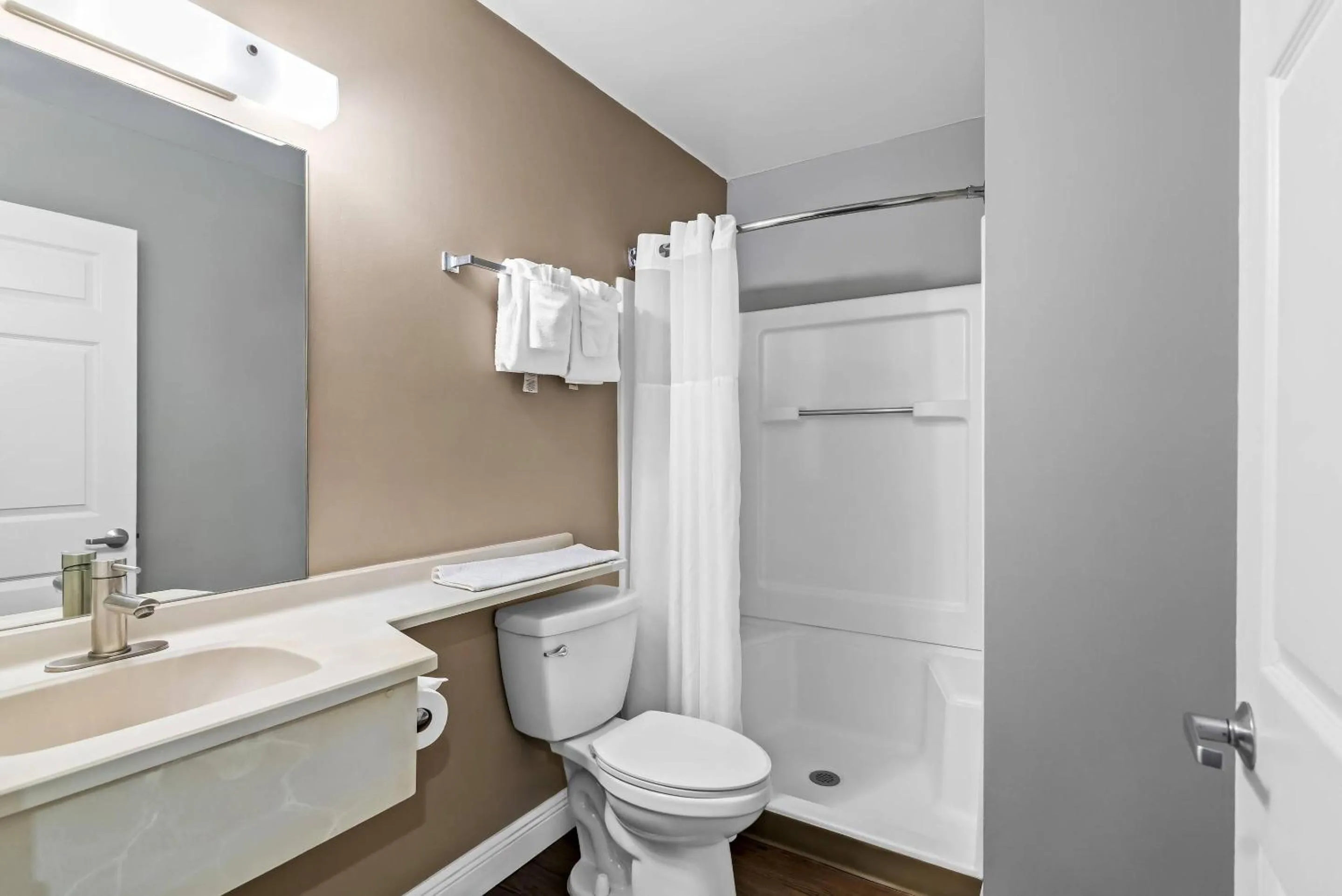 Bedroom in Suburban Studios Stuart near Federal Hwy 1