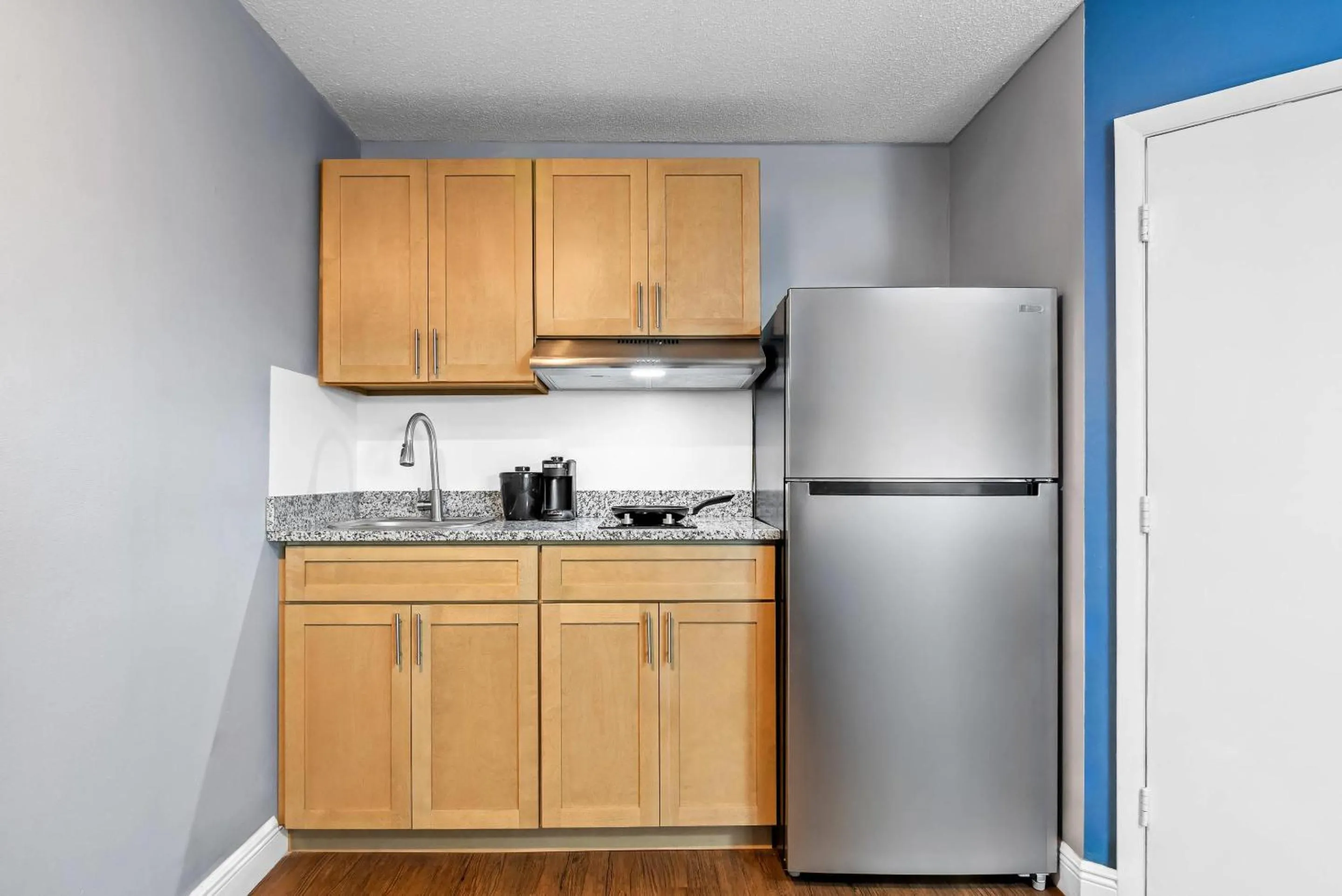 Bedroom in Suburban Studios Stuart near Federal Hwy 1