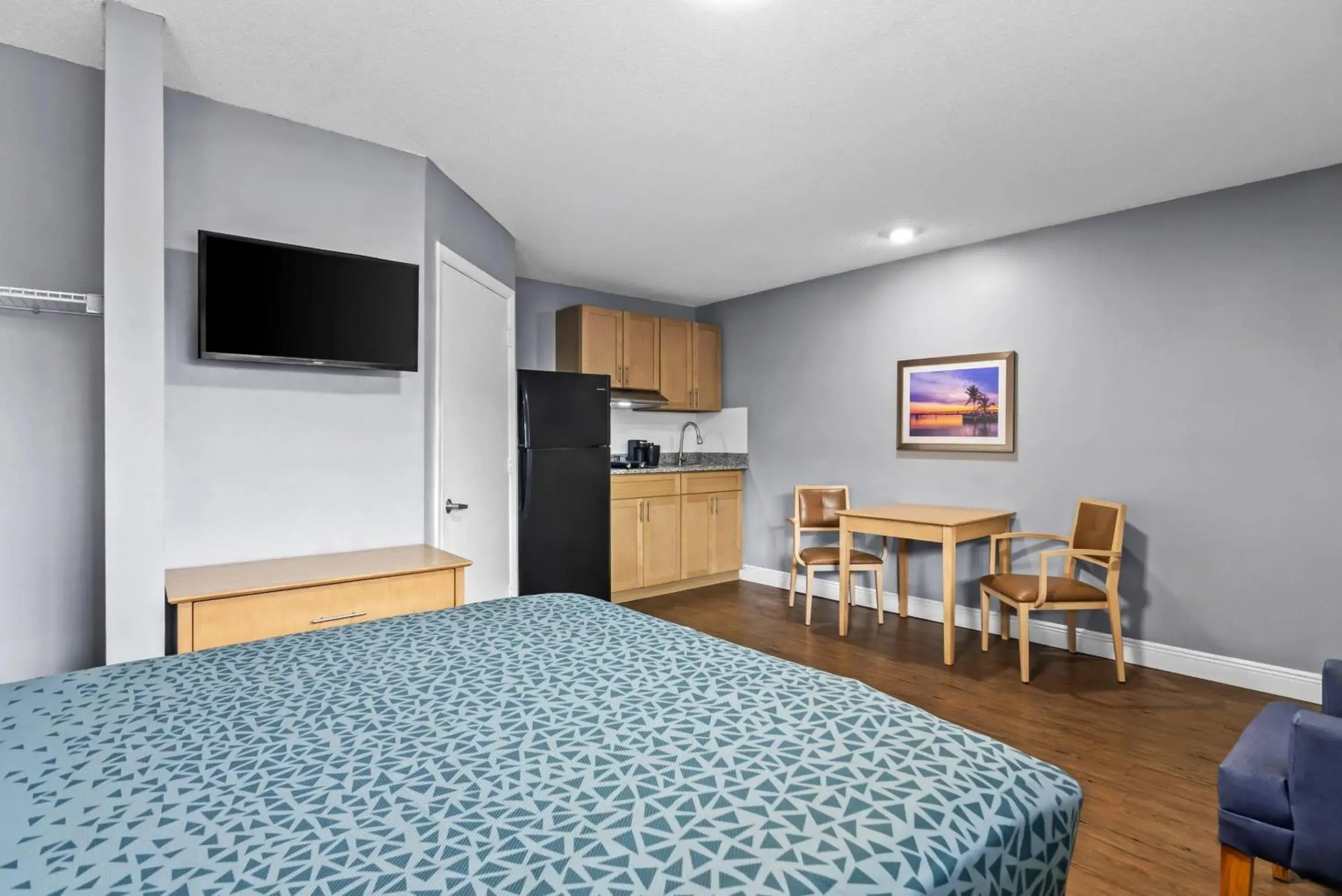 Bedroom, Bed in Suburban Studios Stuart near Federal Hwy 1 Bedroom, Bed in Suburban Studios Stuart near Federal Hwy 1