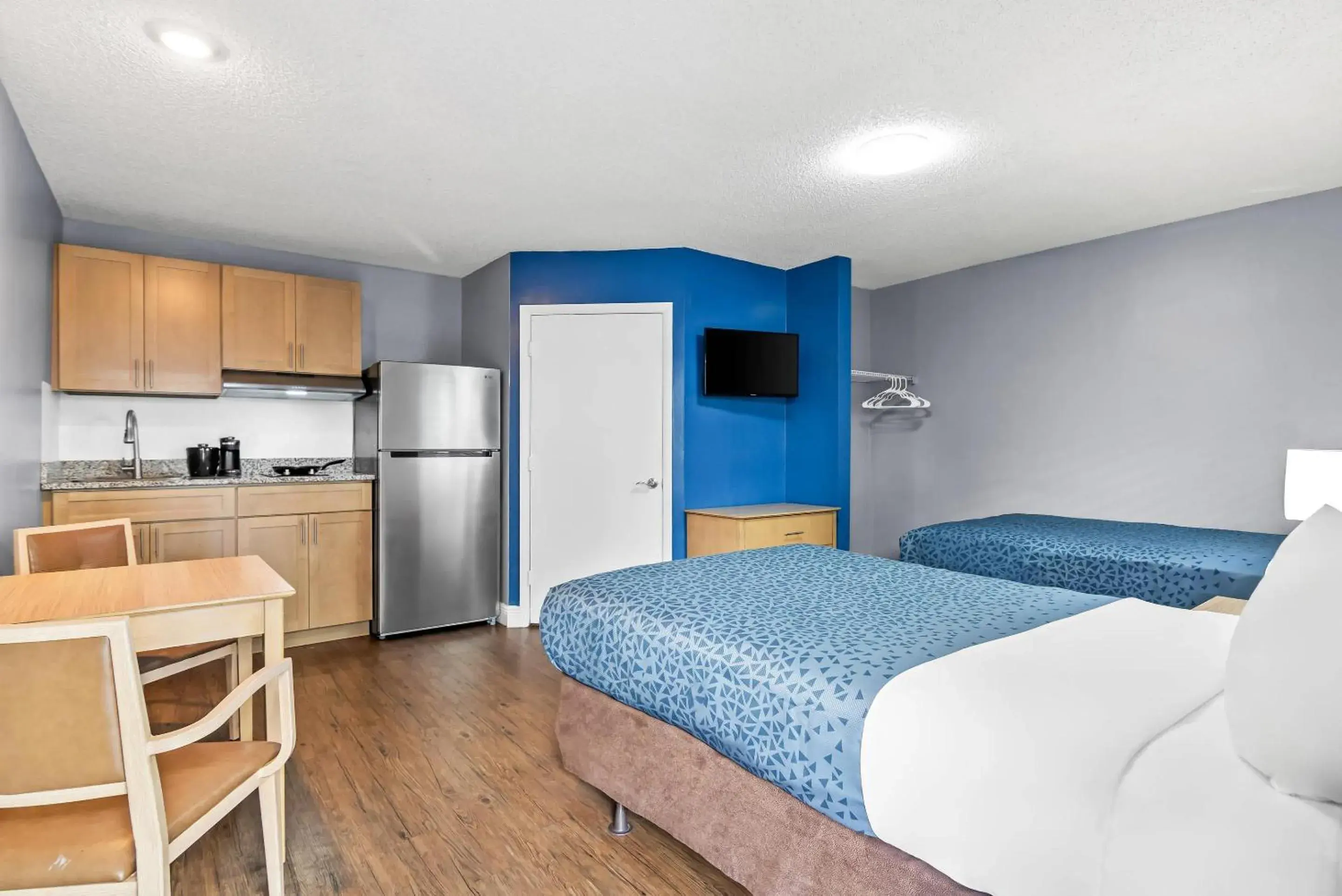 Bedroom, Bed in Suburban Studios Stuart near Federal Hwy 1 Bedroom, Bed in Suburban Studios Stuart near Federal Hwy 1