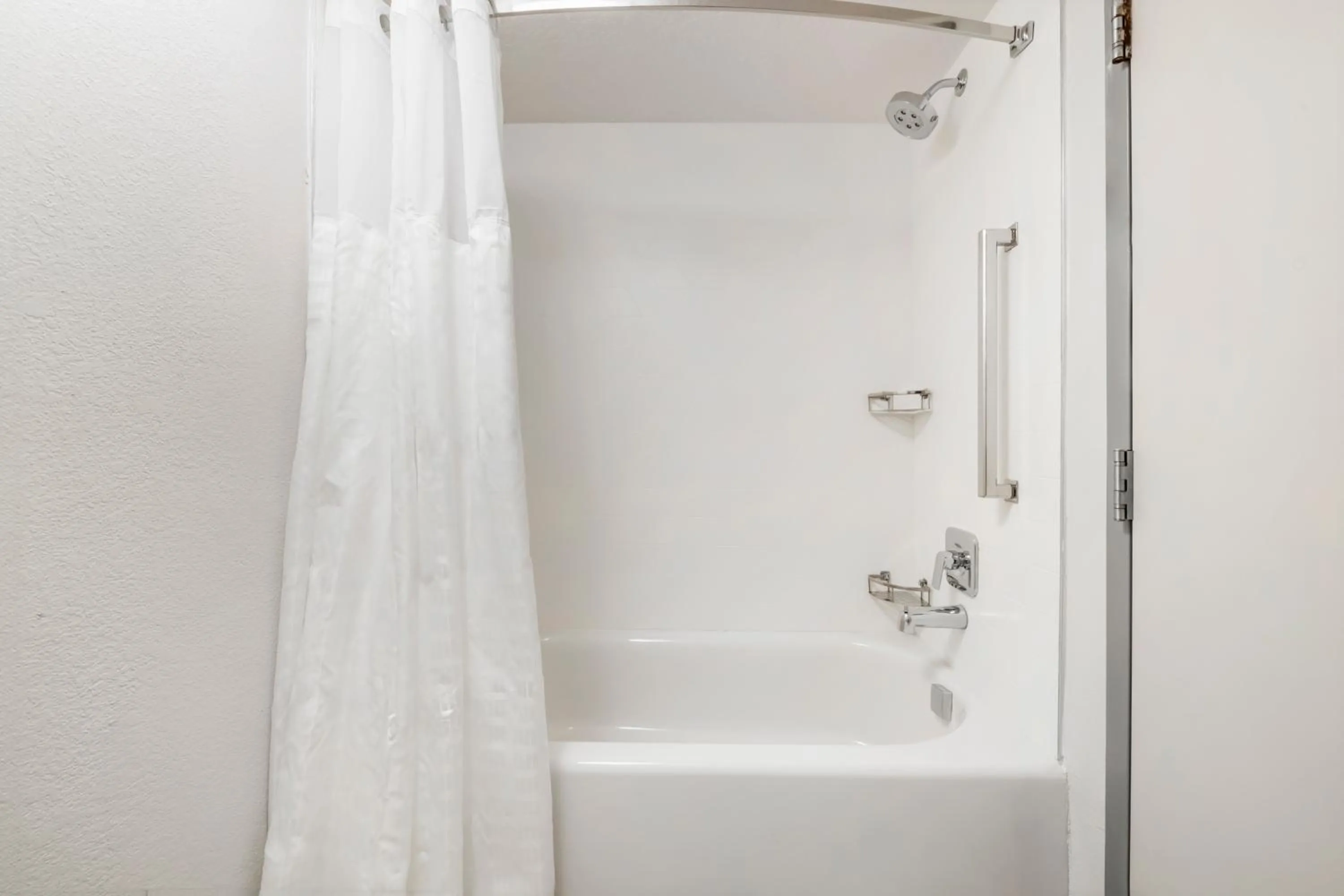 Shower in Comfort Inn & Suites Near Universal Orlando Resort-Convention Ctr