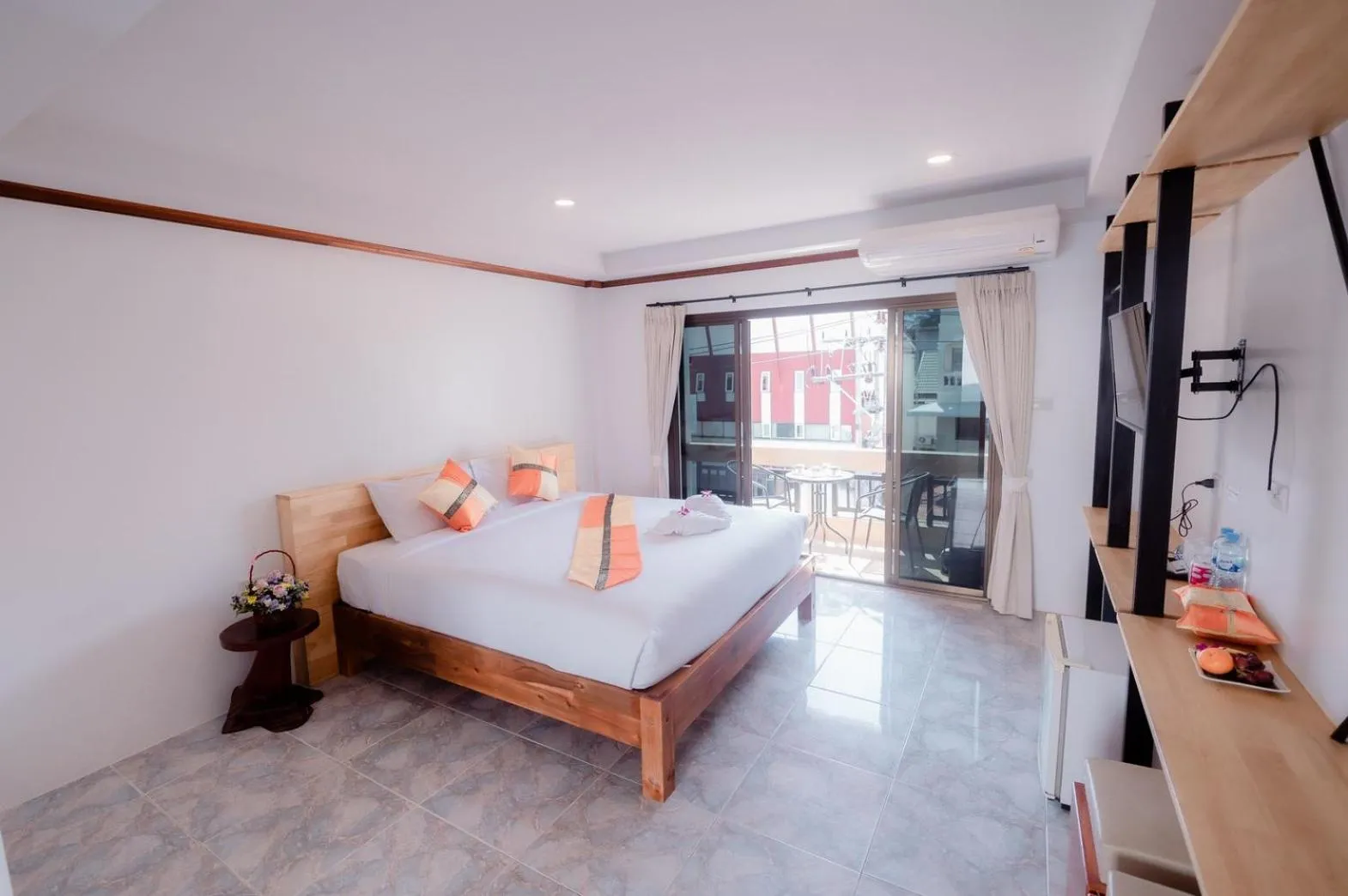 Bed in Coconut Grove Hotel Samui