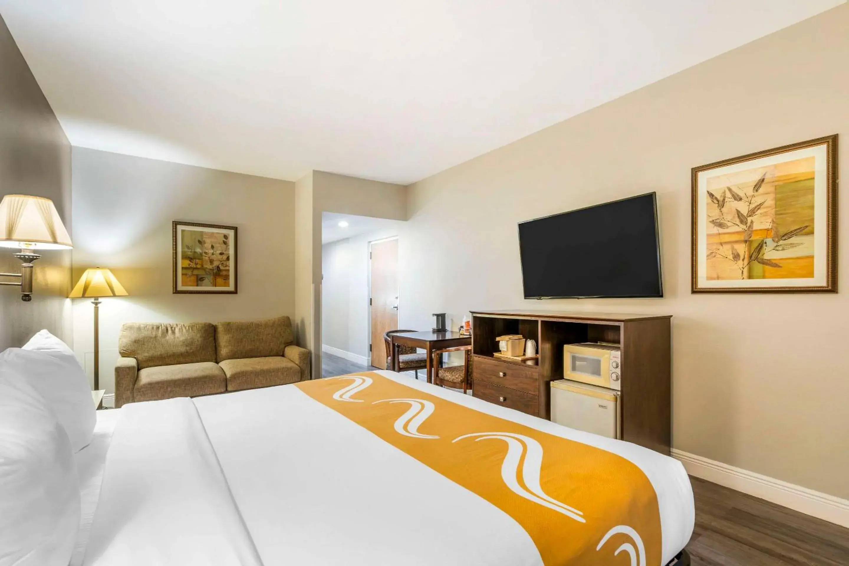 Bedroom, TV/Entertainment Center in Quality Inn Conference Center at Citrus Hills Bedroom, TV/Entertainment Center in Quality Inn Conference Center at Citrus Hills