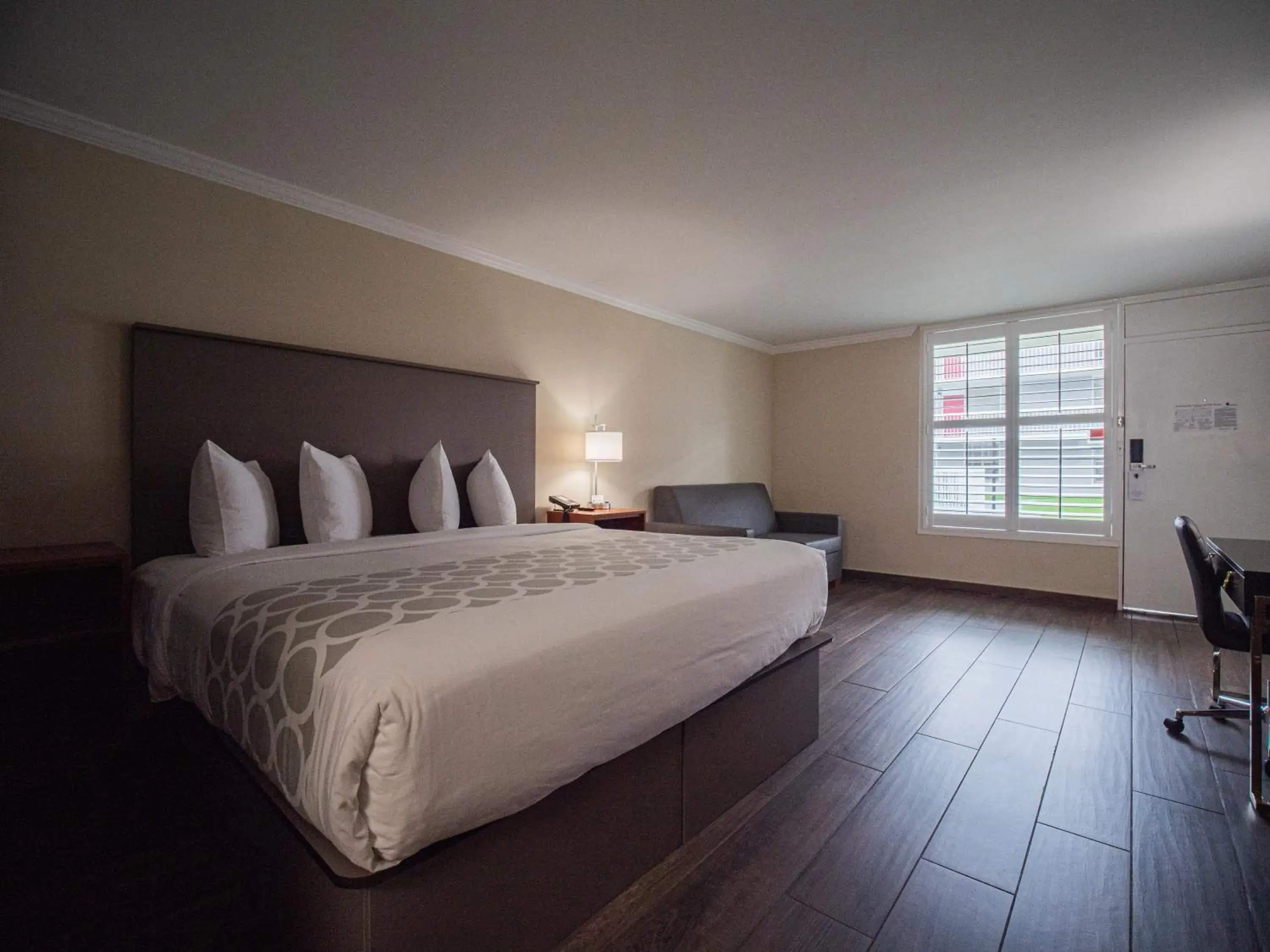 Bedroom, Bed in The Equus Inn & Suites Ocala