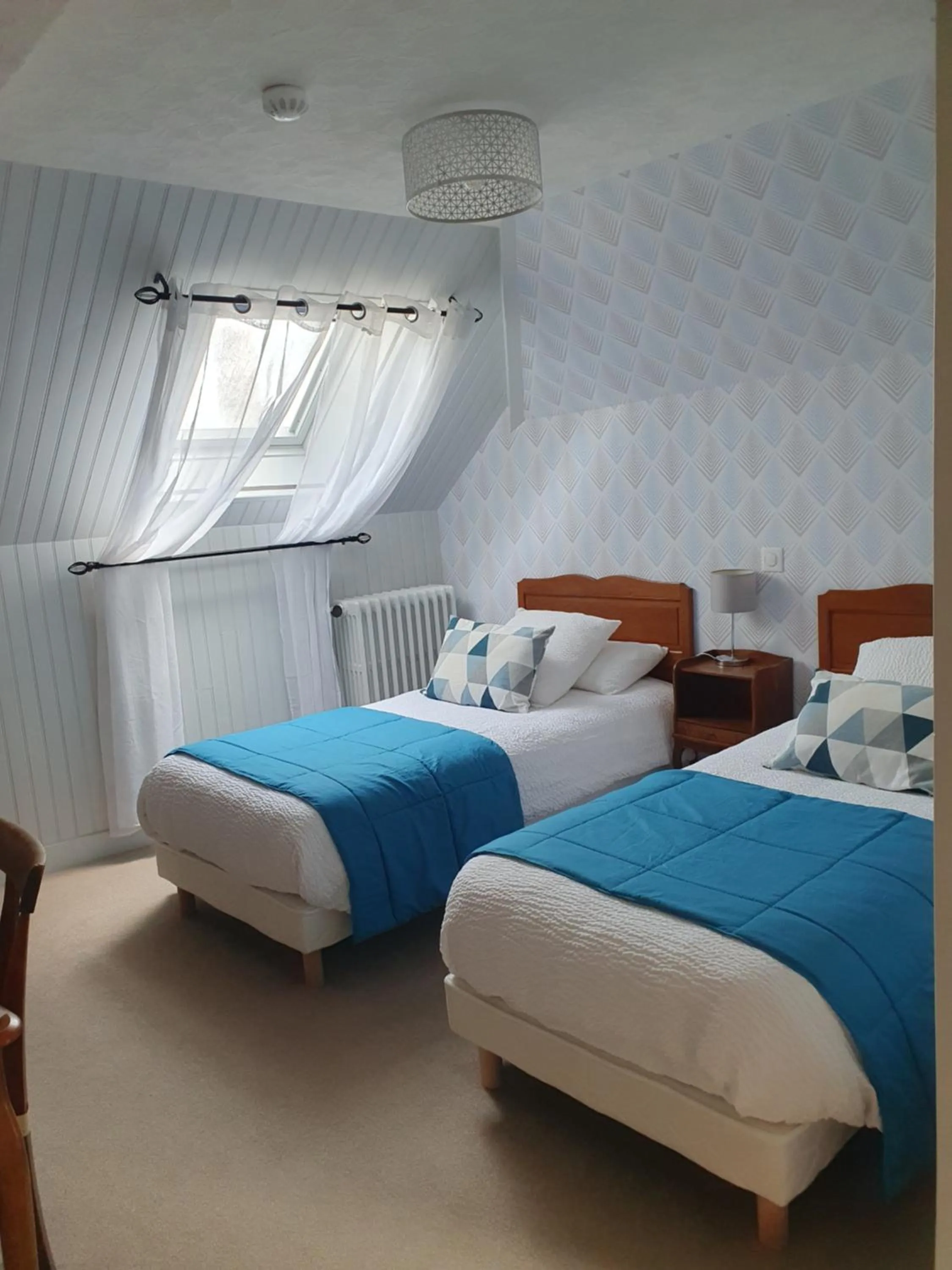 Bed in Logis hôtel LE COR D'ARGENT