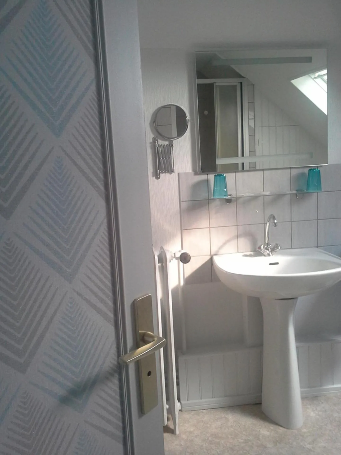 Bathroom in Logis hôtel LE COR D'ARGENT