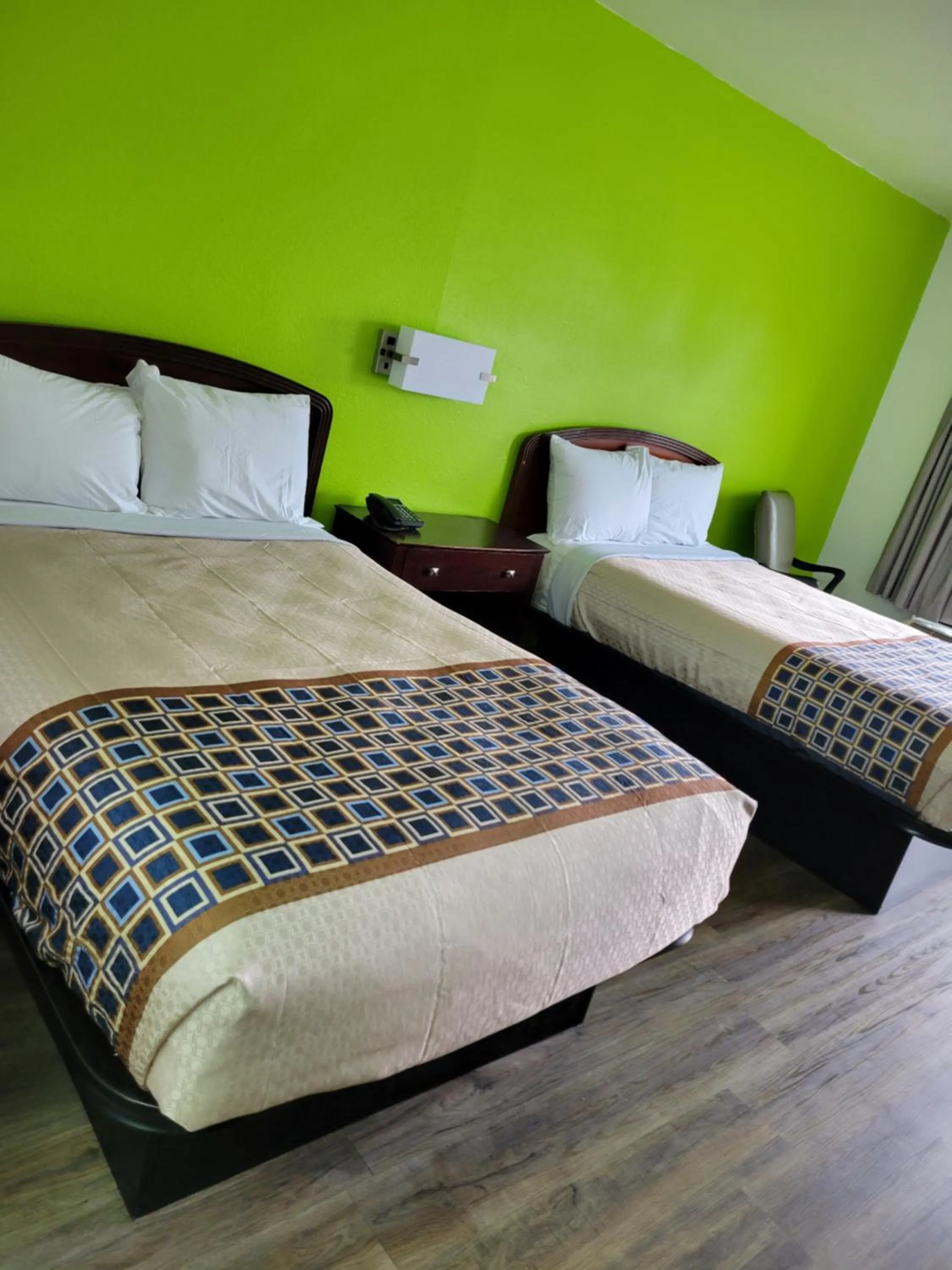 Bed in Budgetel Inn and Suites- FORT GORDON