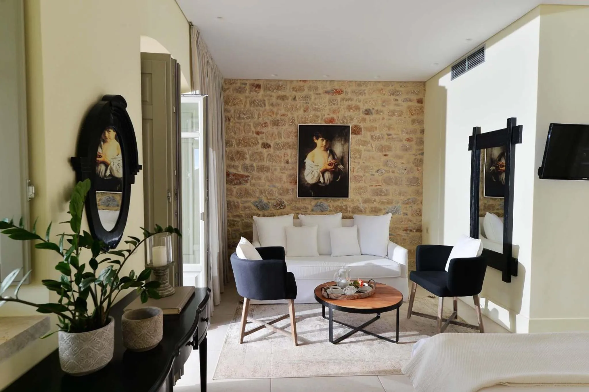 Photo of the whole room, Bed in Akrolithi Boutique Hotel & Suites