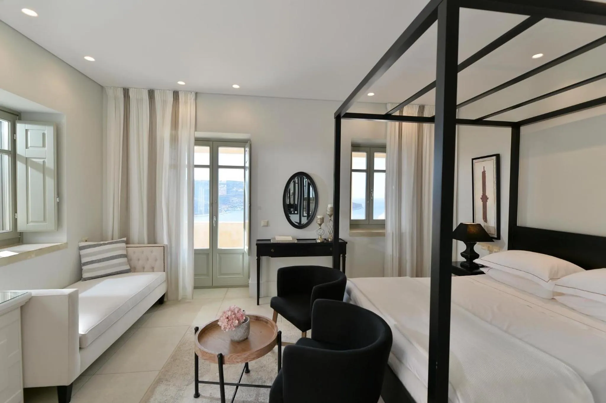Photo of the whole room, Bed in Akrolithi Boutique Hotel & Suites