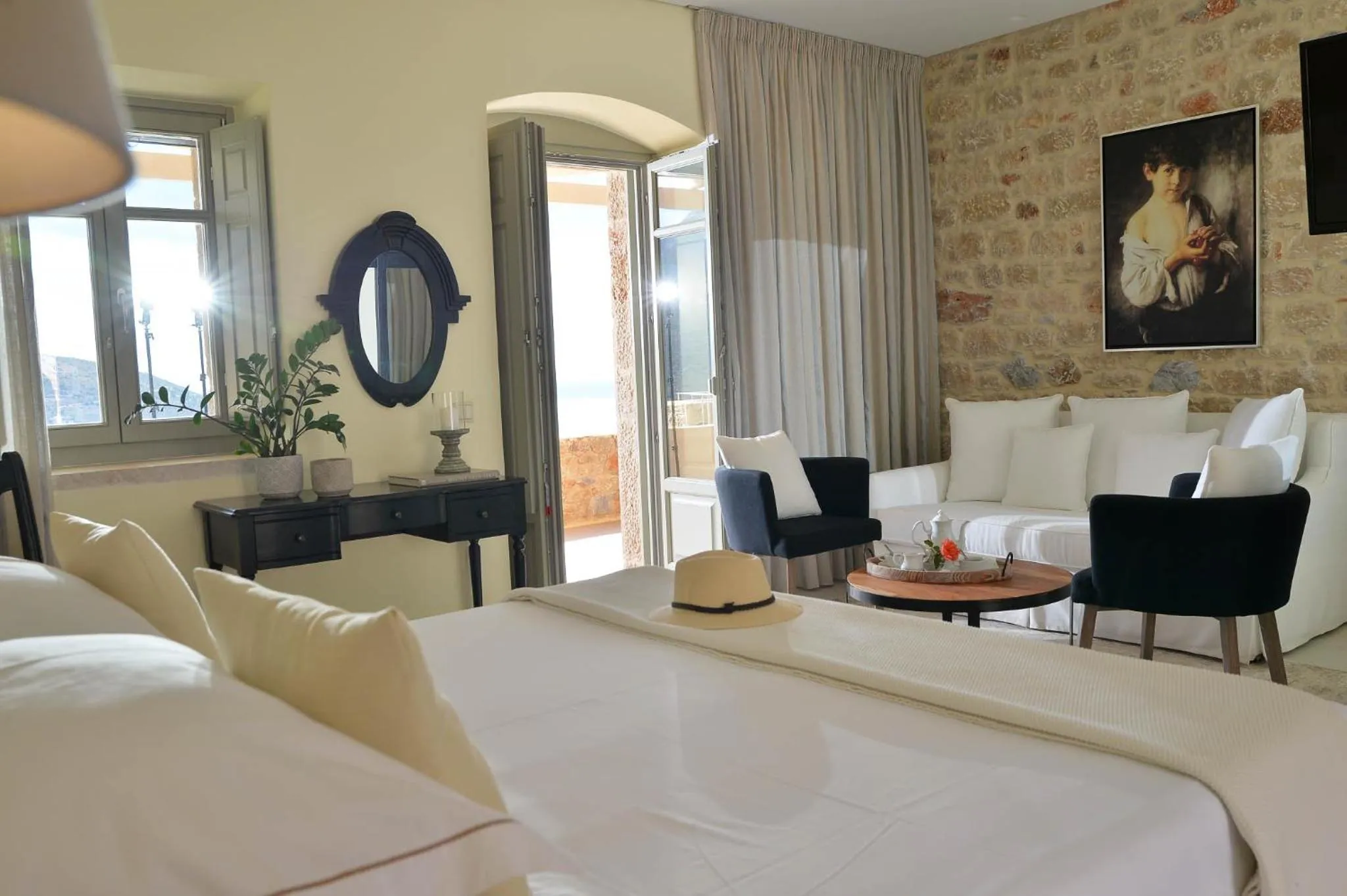 Photo of the whole room, Bed in Akrolithi Boutique Hotel & Suites