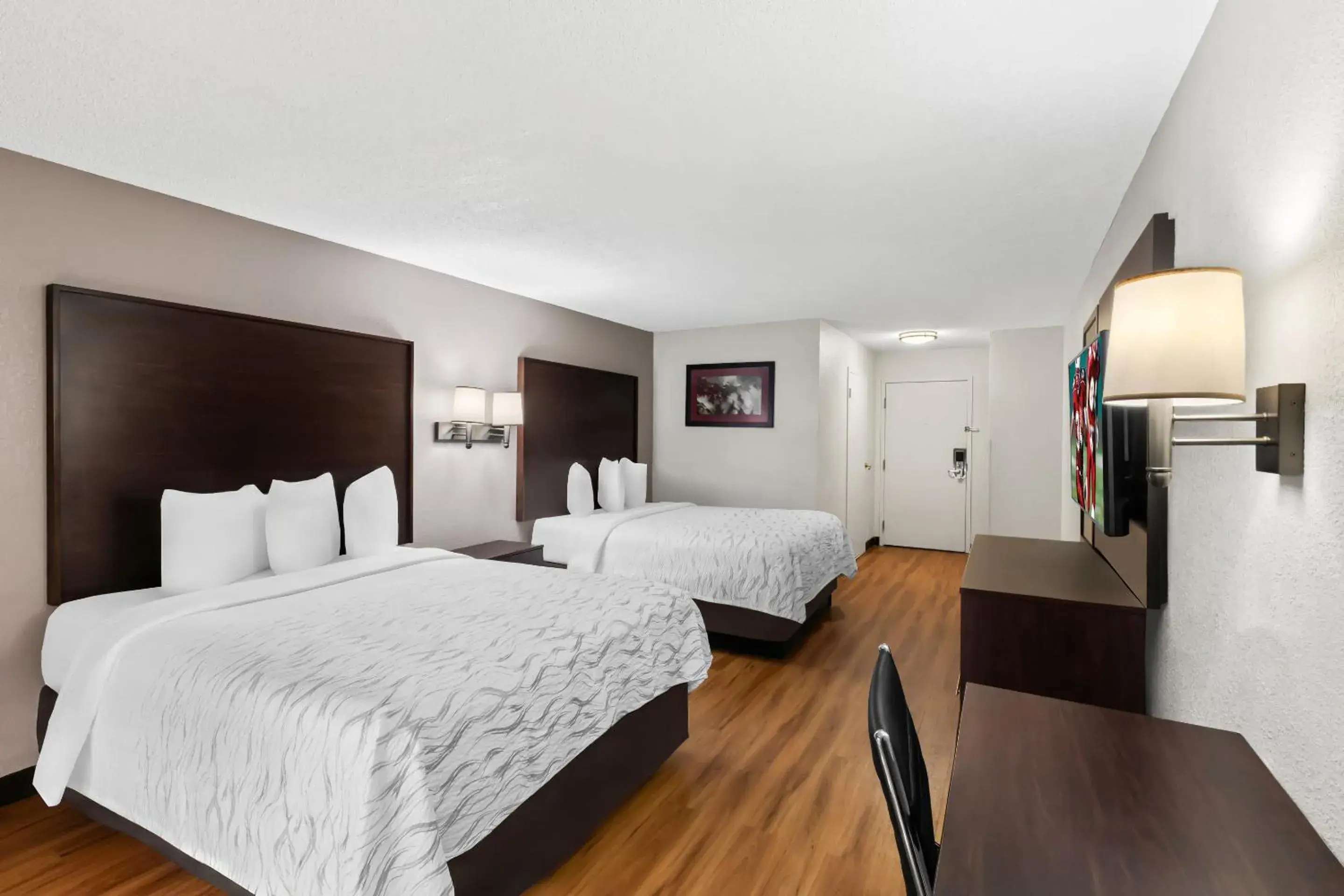 Property building, Bed in Red Roof PLUS+ & Suites Atlanta Airport South Property building, Bed in Red Roof PLUS+ & Suites Atlanta Airport South