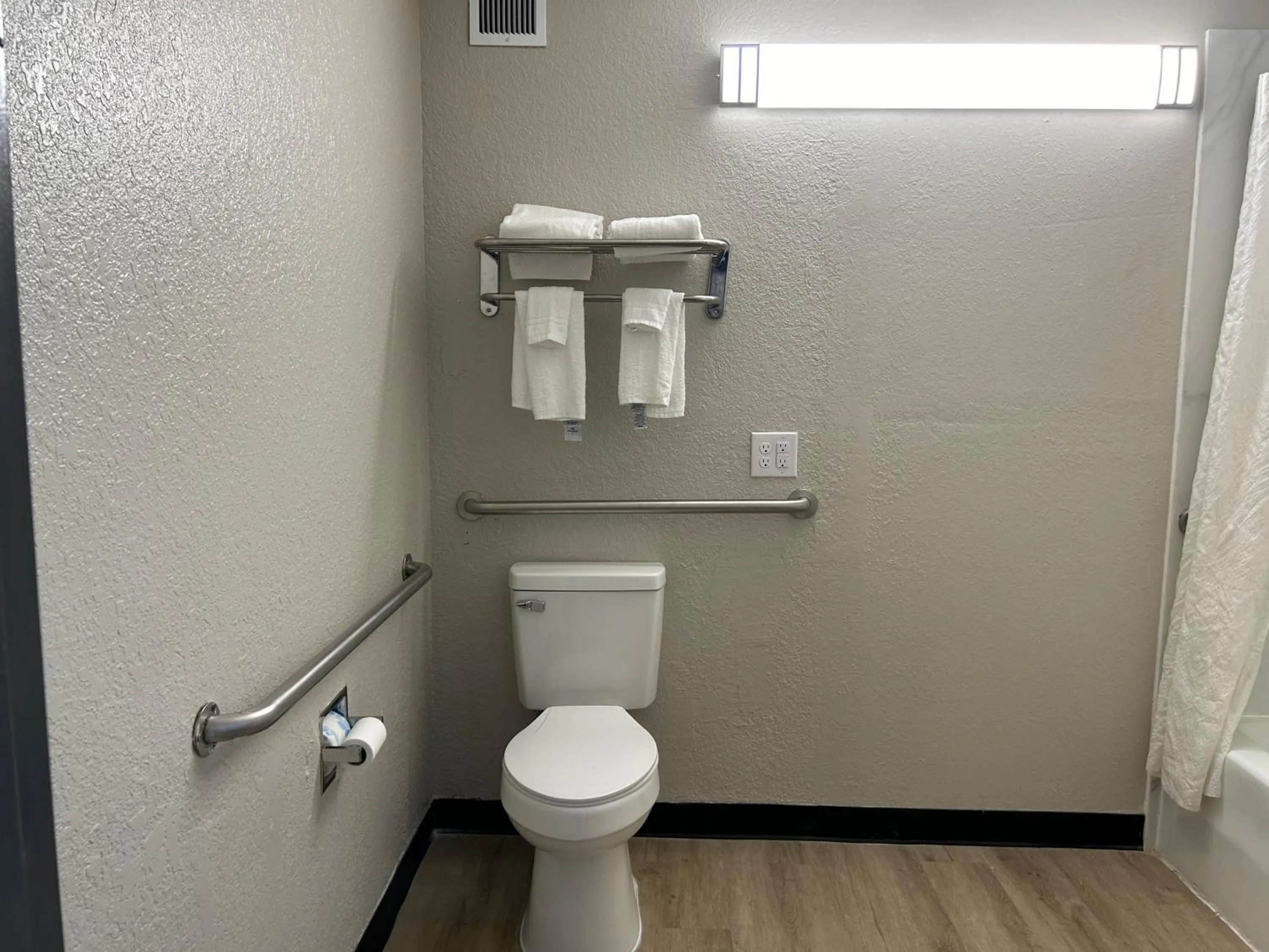 Toilet, Bathroom in Econo Lodge Hinesville