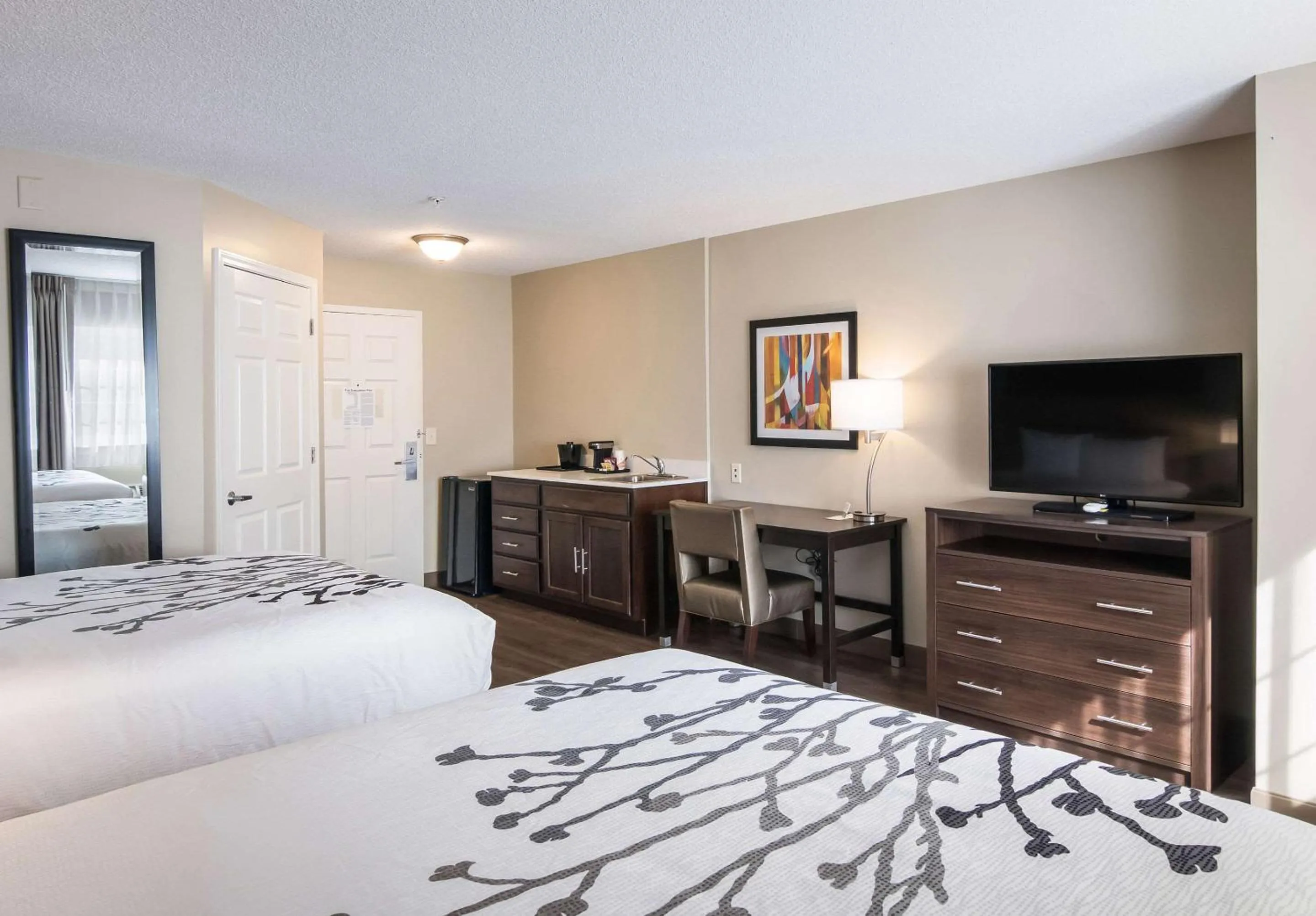 Photo of the whole room, Bed in Sleep Inn & Suites Columbus near Fort Benning