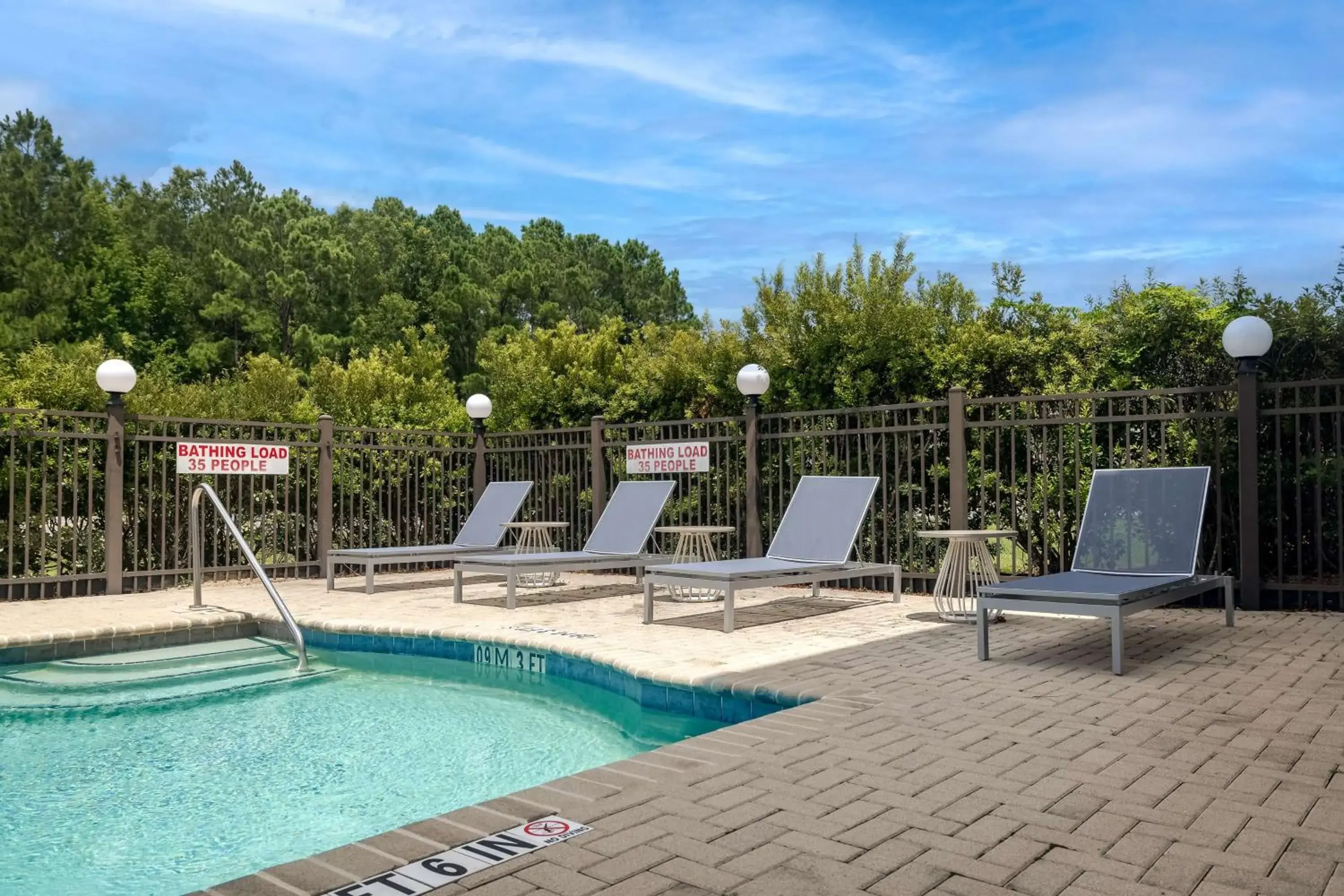 Pool view in Spark by Hilton Savannah Airport Pool view in Spark by Hilton Savannah Airport