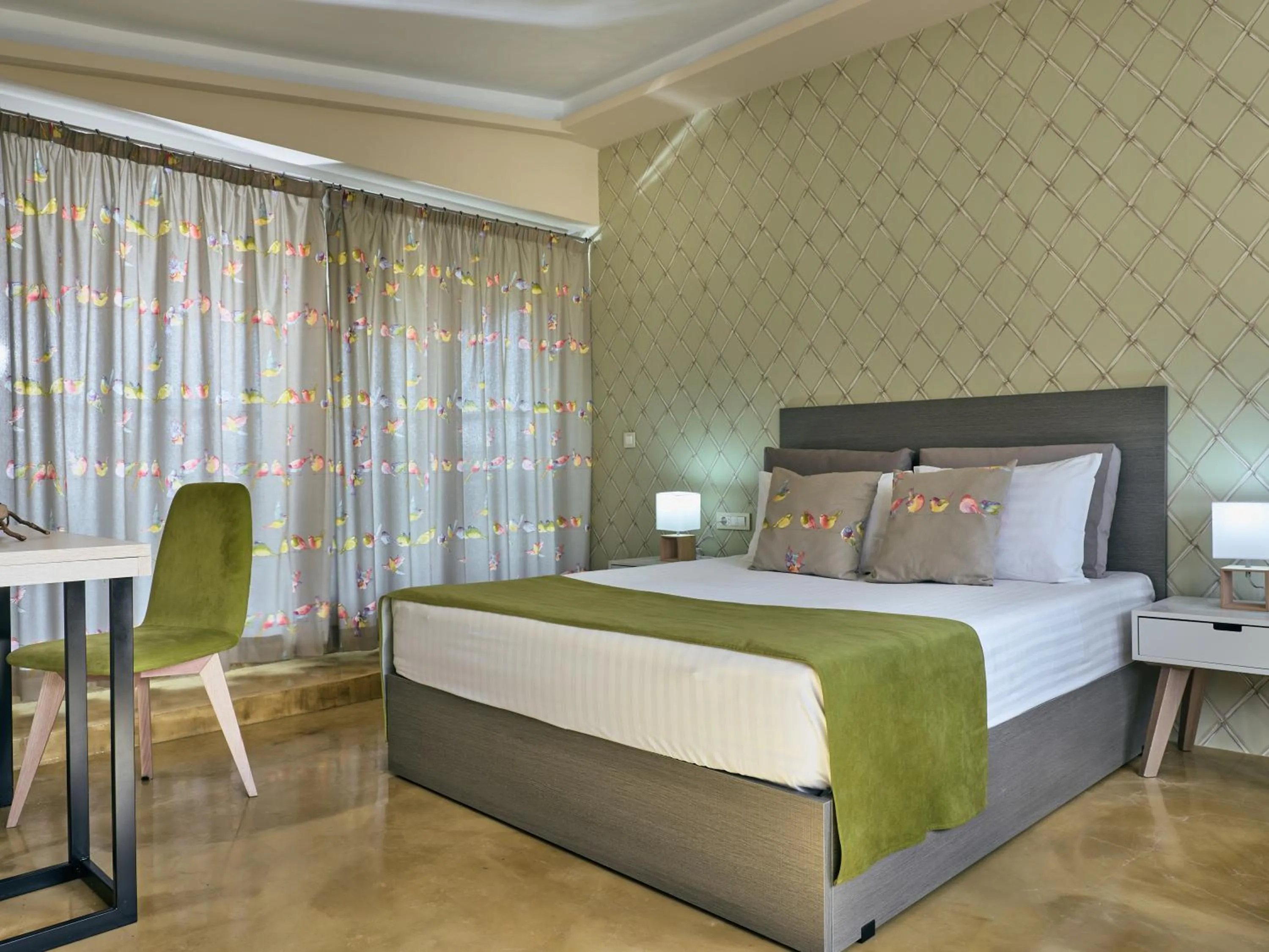 Bed in Koukounaria Hotel & Suites