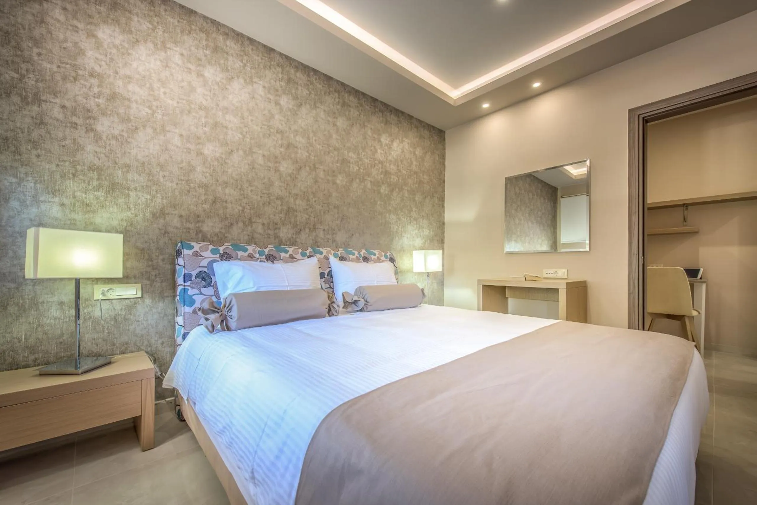 Bed in Koukounaria Hotel & Suites