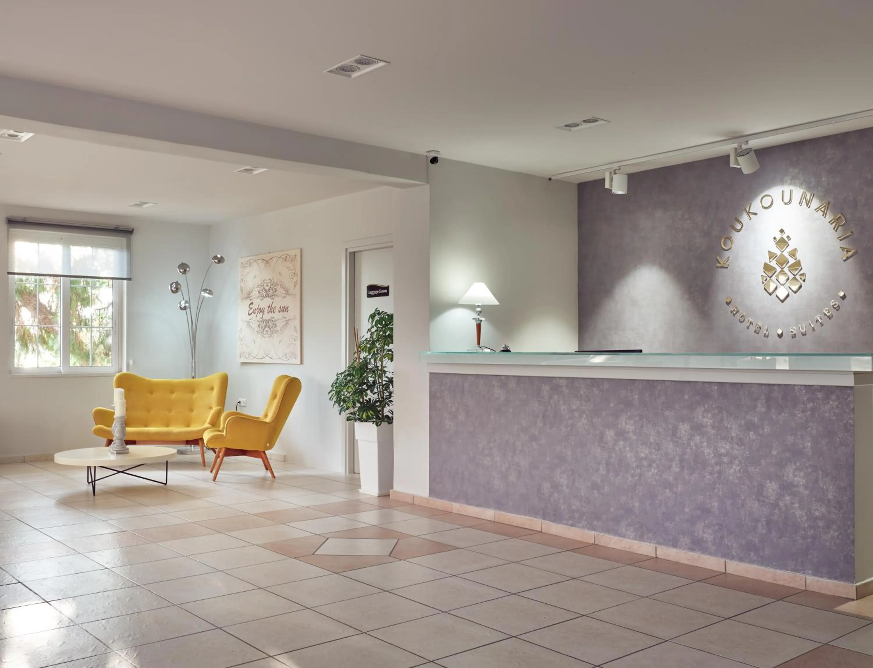 Lobby or reception in Koukounaria Hotel & Suites