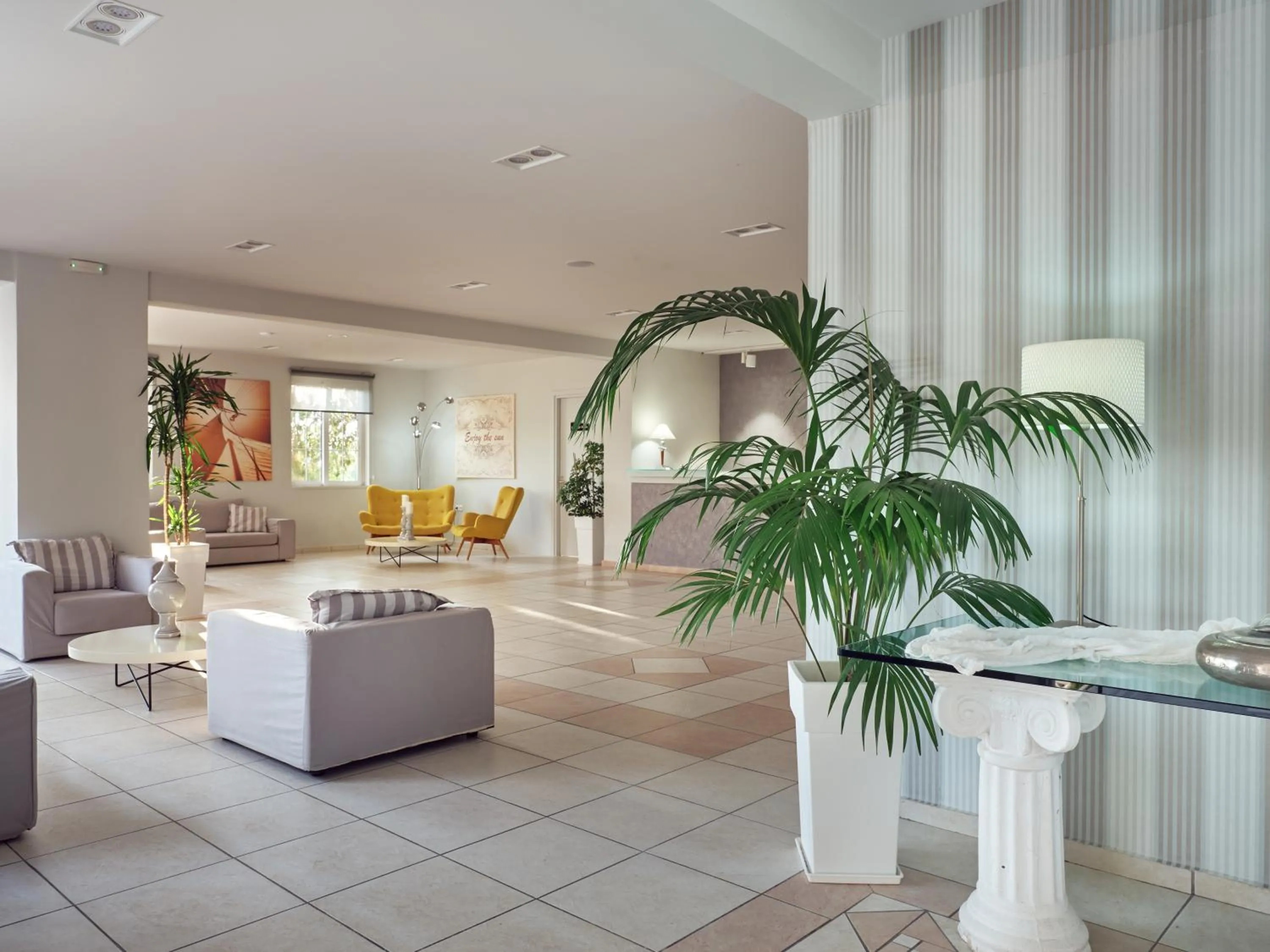 Lobby or reception in Koukounaria Hotel & Suites
