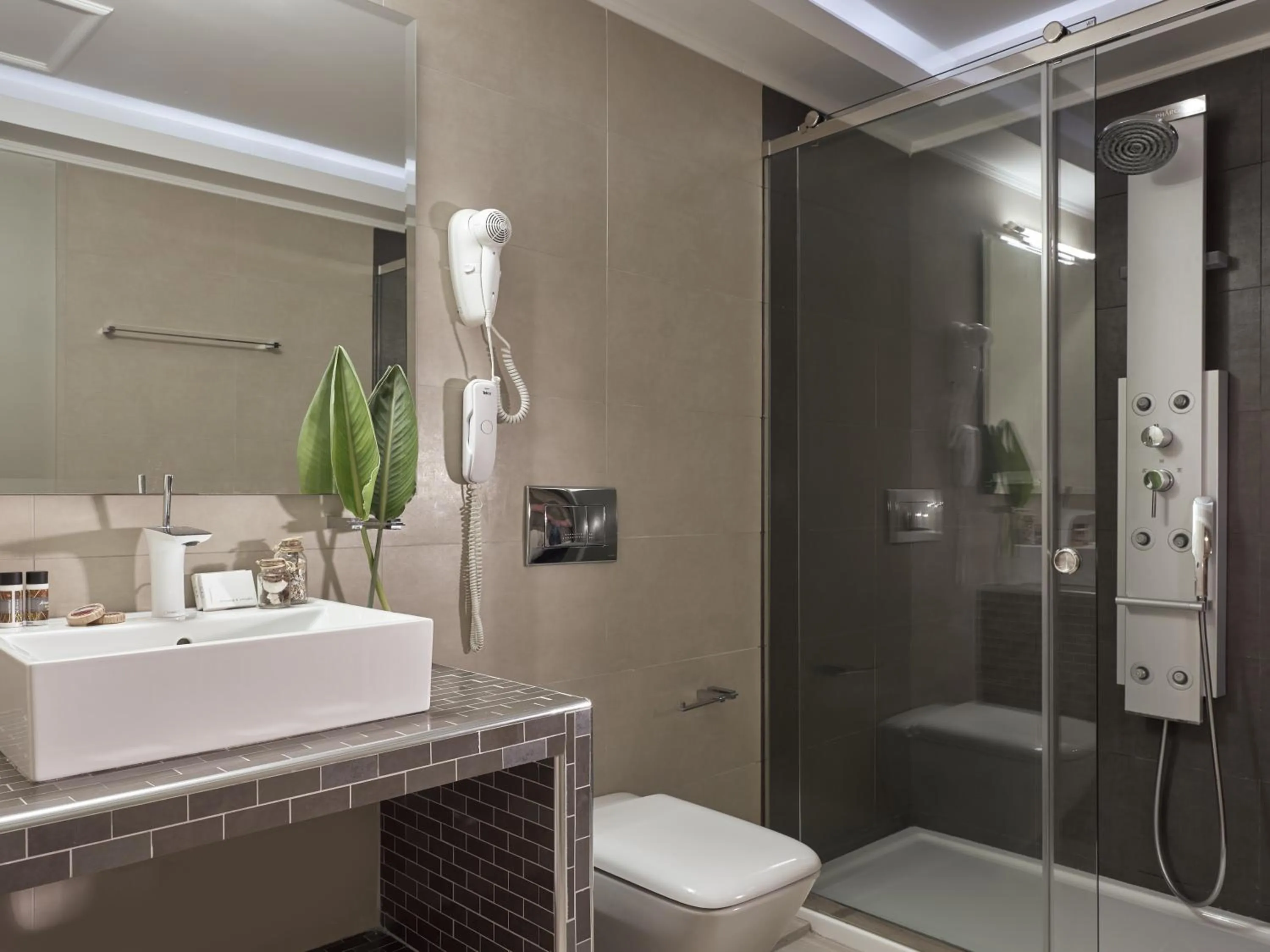 Shower in Koukounaria Hotel & Suites