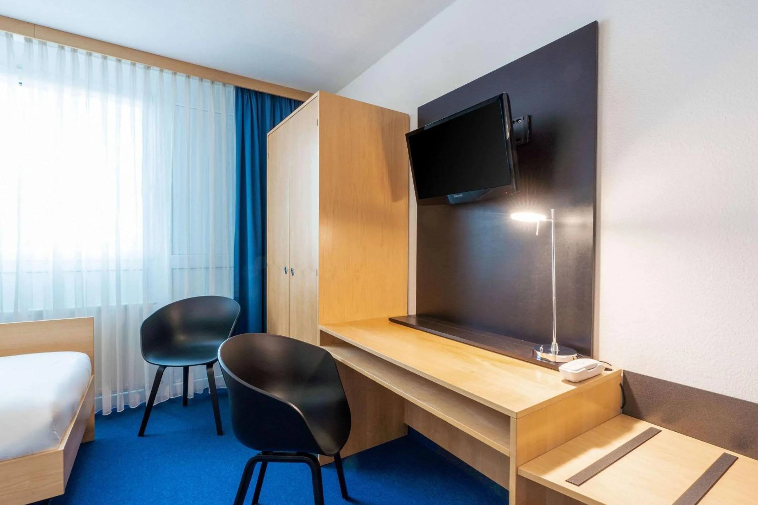 Photo of the whole room, Bed in Comfort Hotel Atlantic Muenchen Sued