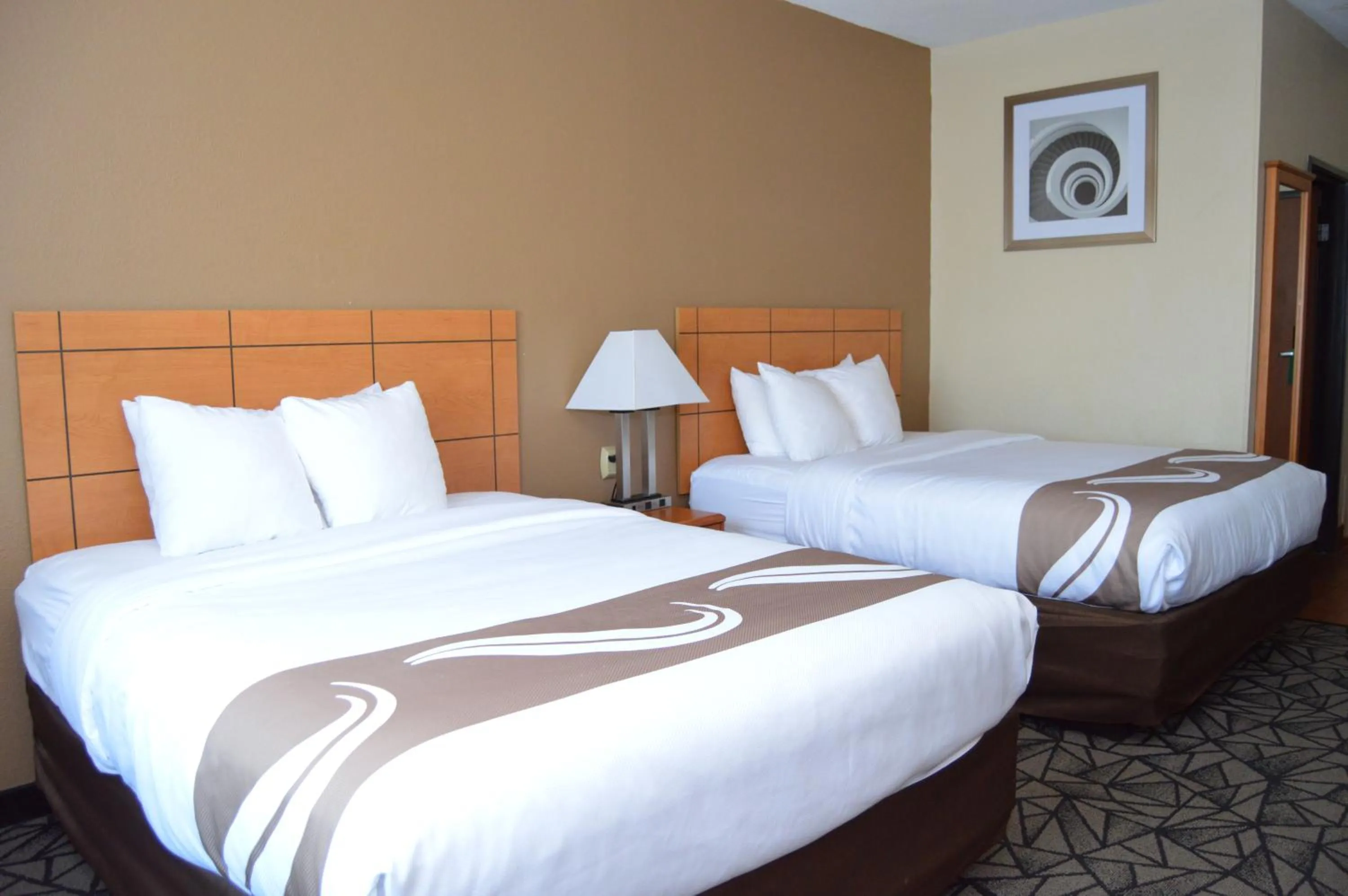 Bedroom, Bed in Quality Inn Coralville - Iowa River Landing