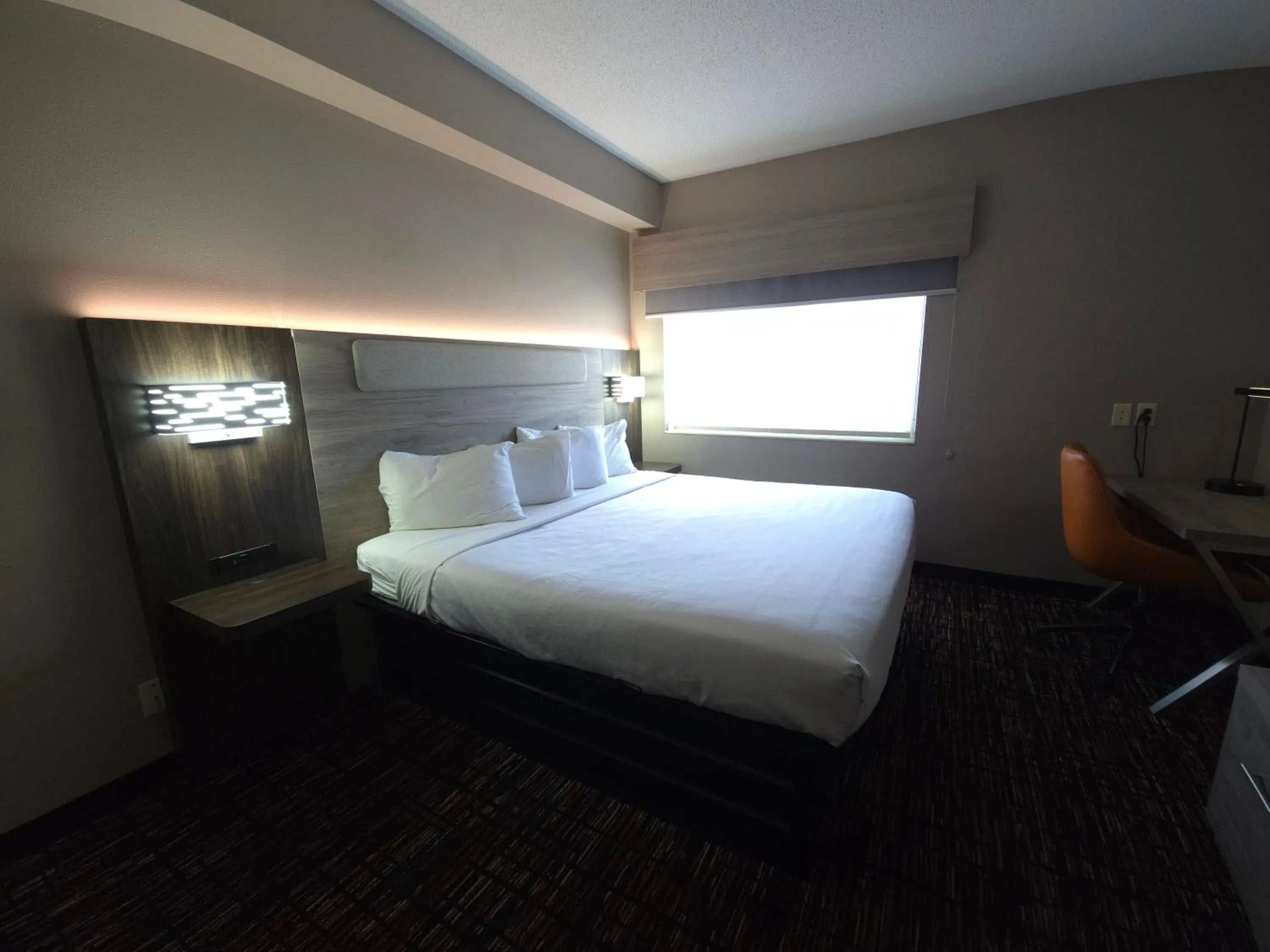 Bed in Reston Inn & Suites