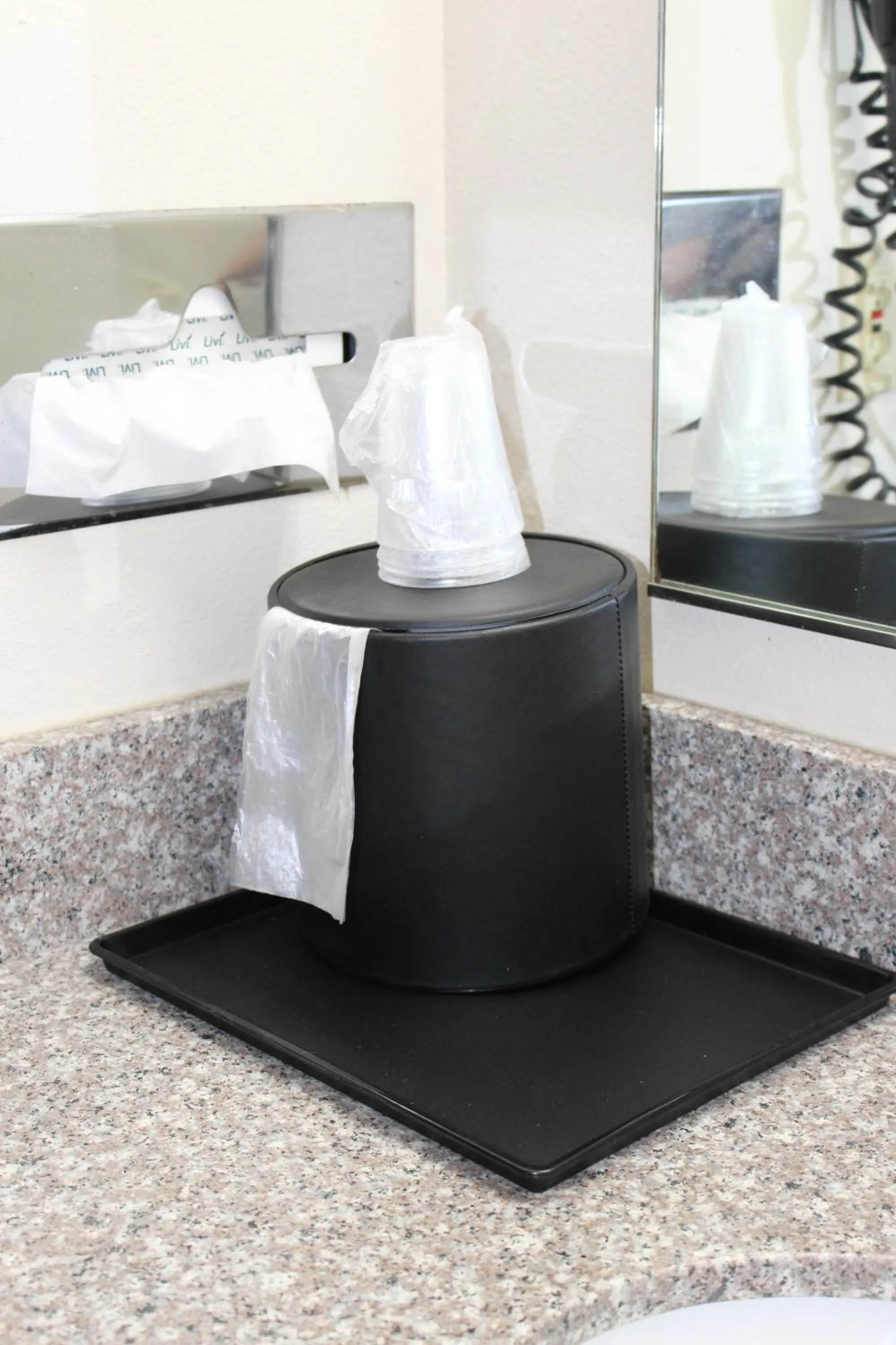 Bed in Reston Inn & Suites