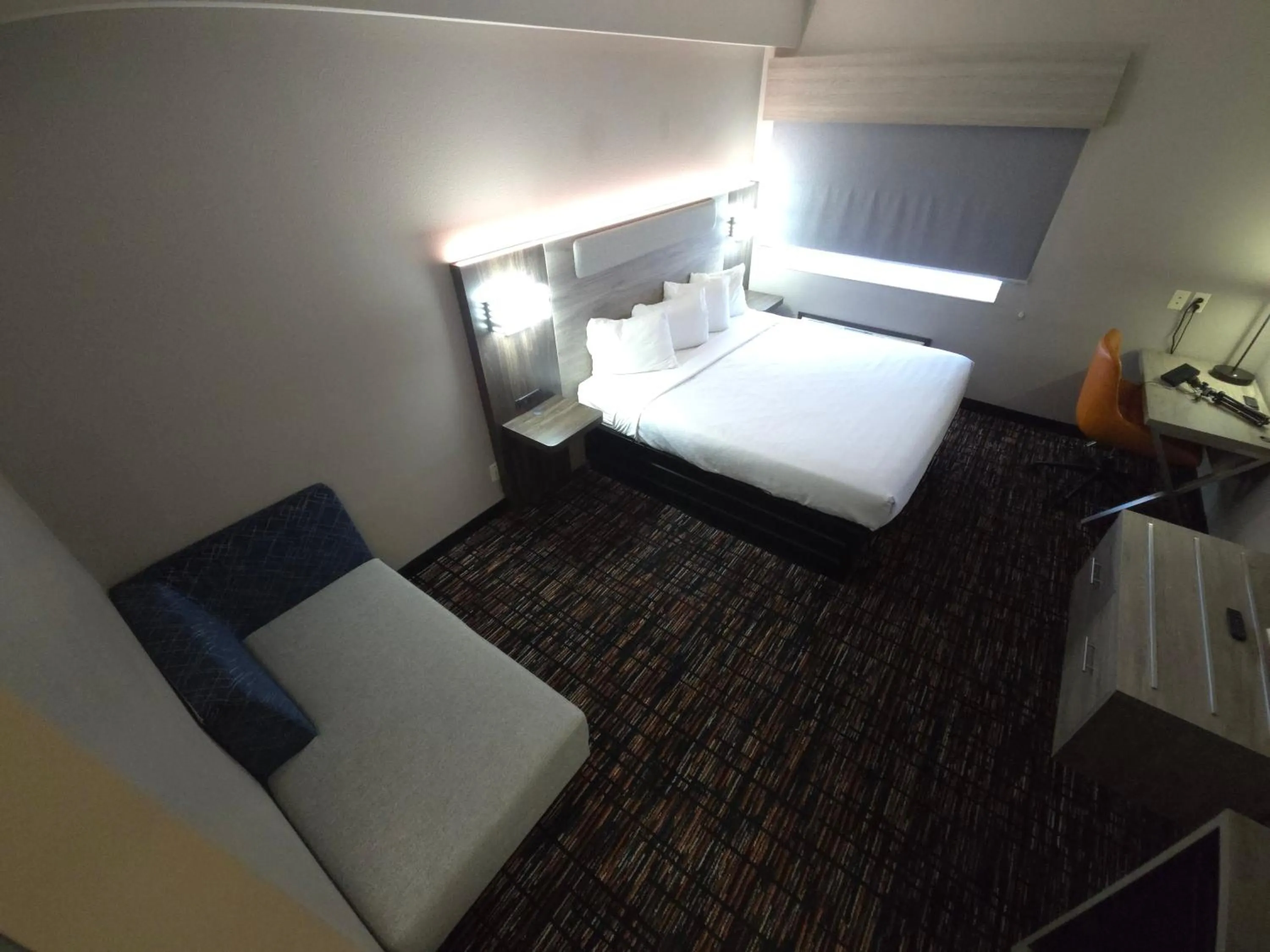 Bed in Reston Inn & Suites